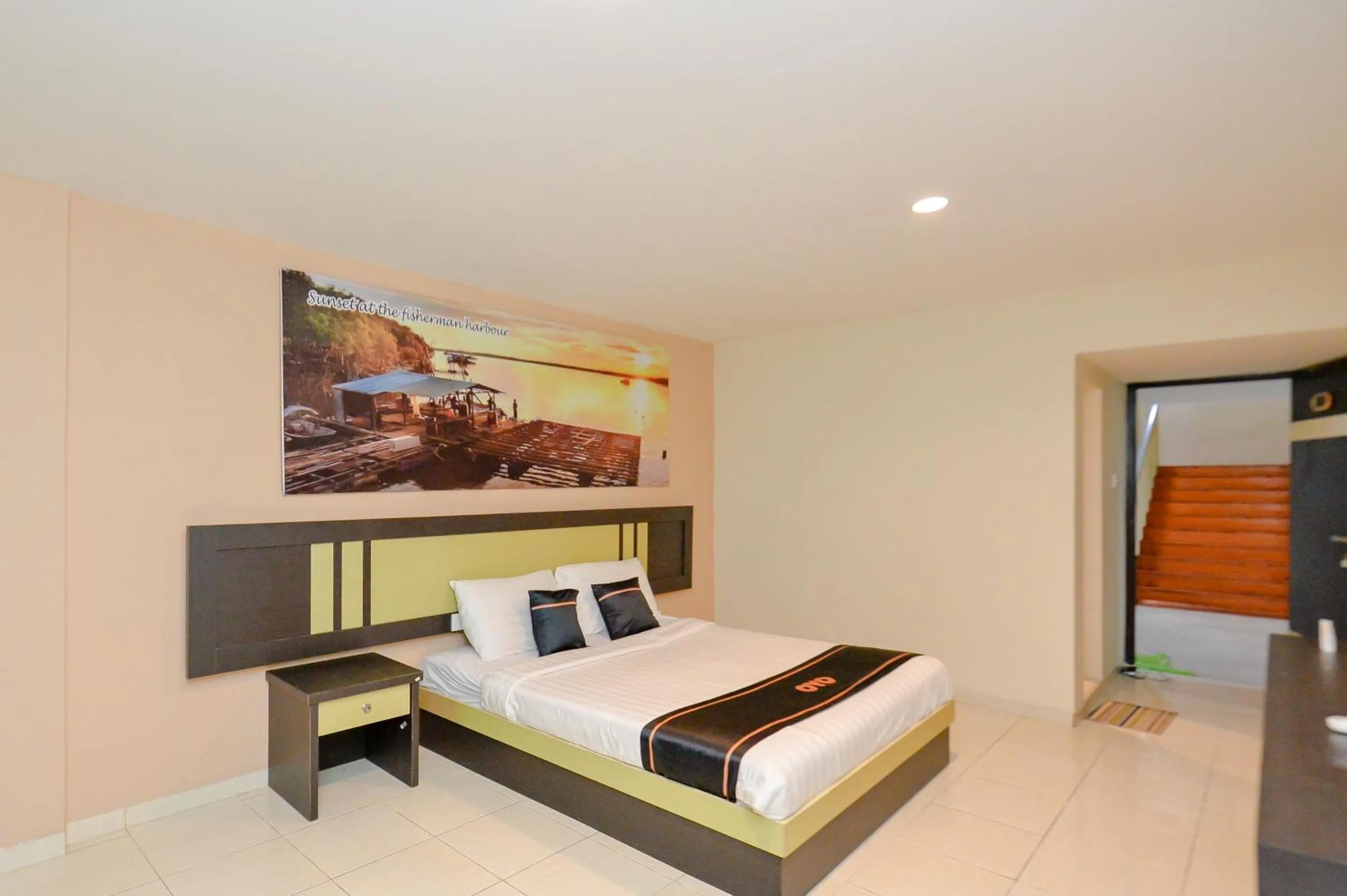 Bedroom in OYO 2487 Sampurna Jaya Hotel