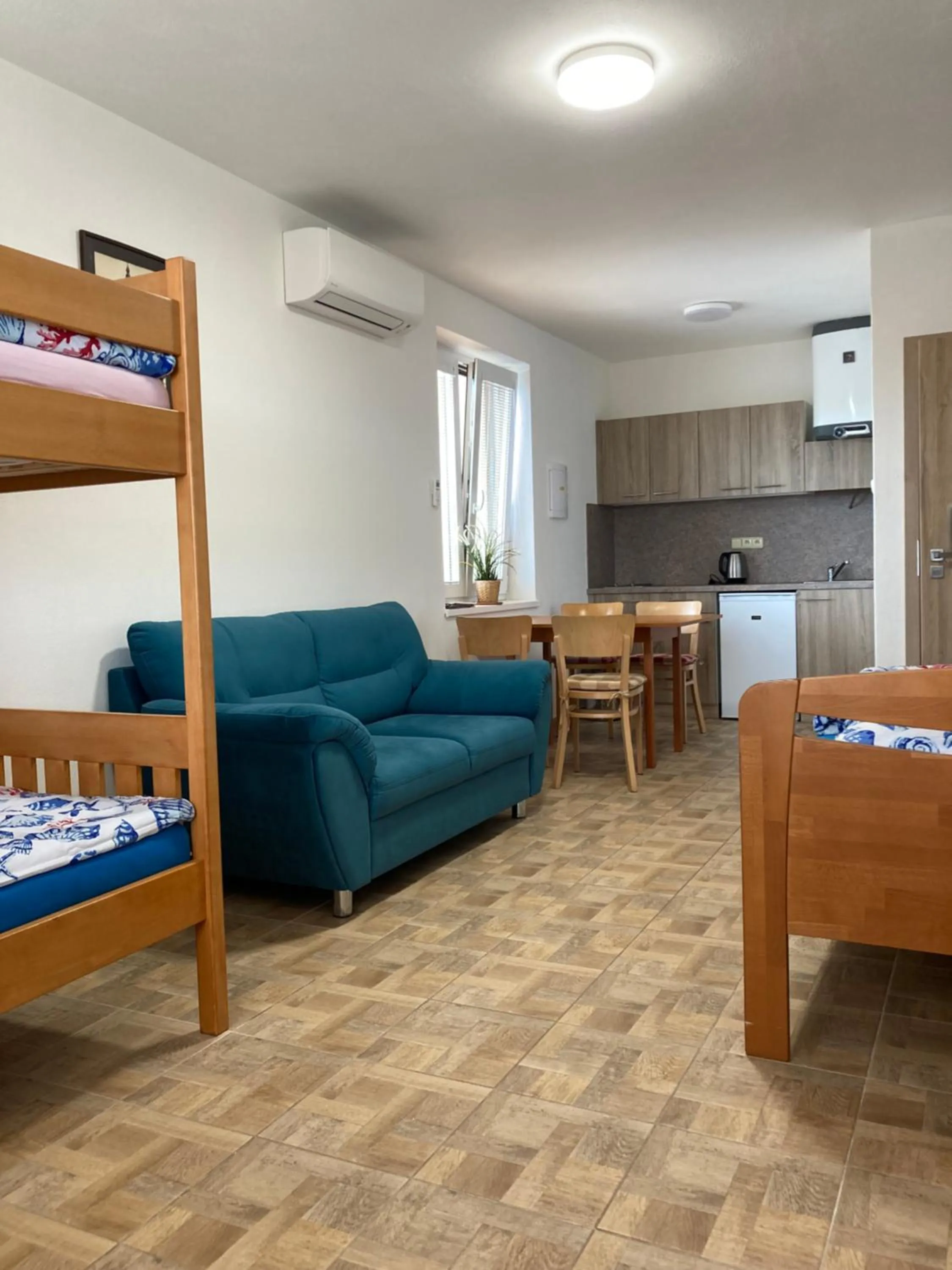 Bed in Apartmány s klimatizací - Penzion U Kudláčků Pouzdřany