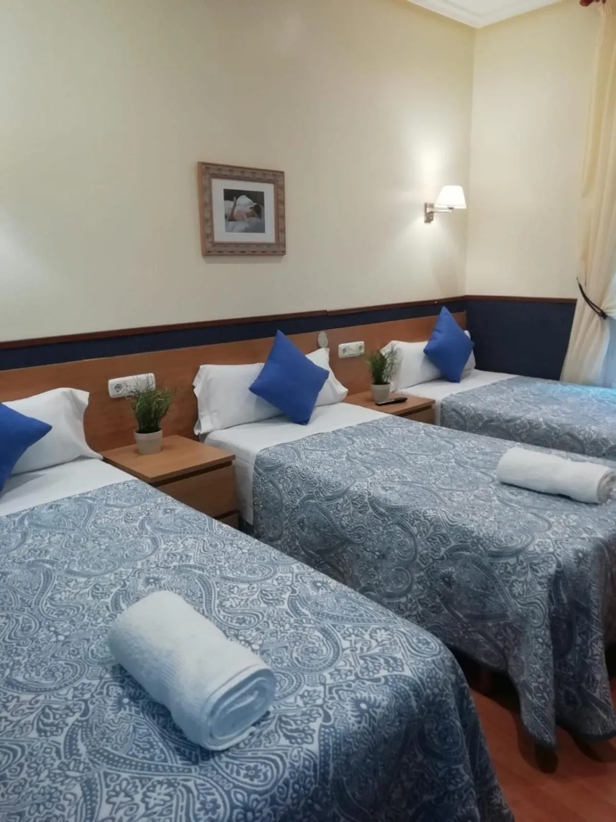 Bed in Pensión San Jerónimo