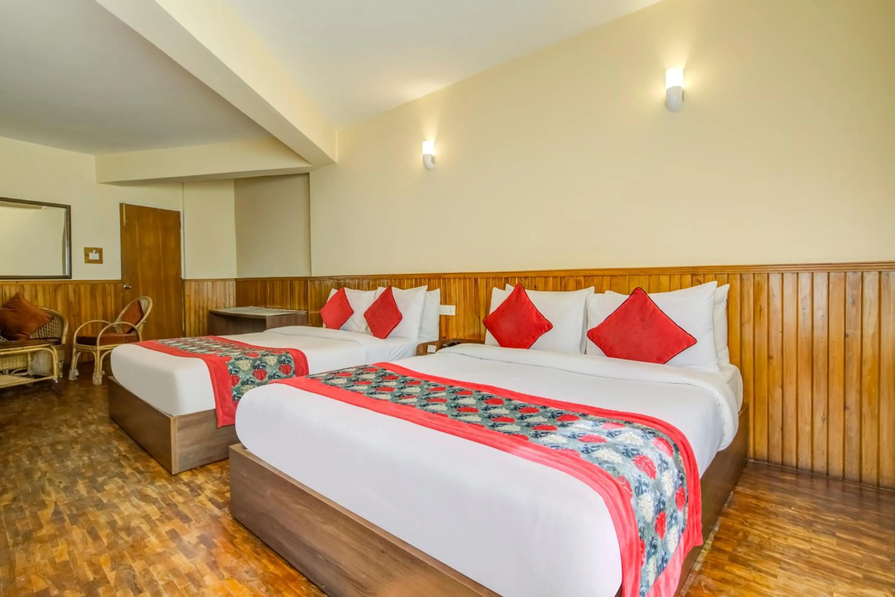 Bed in Summit Newa Regency