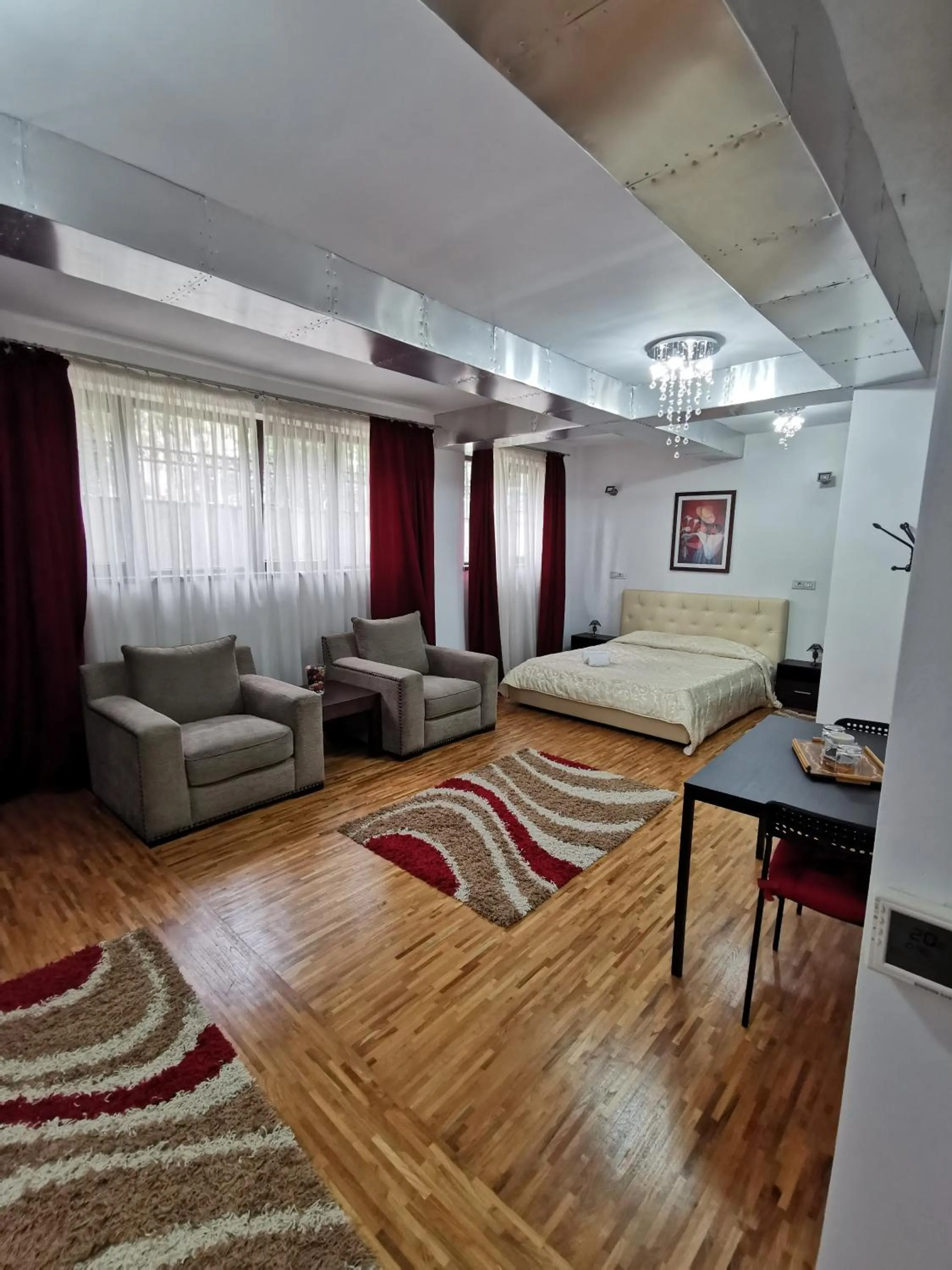 Seating area, Bed in Prince Residence Apartments