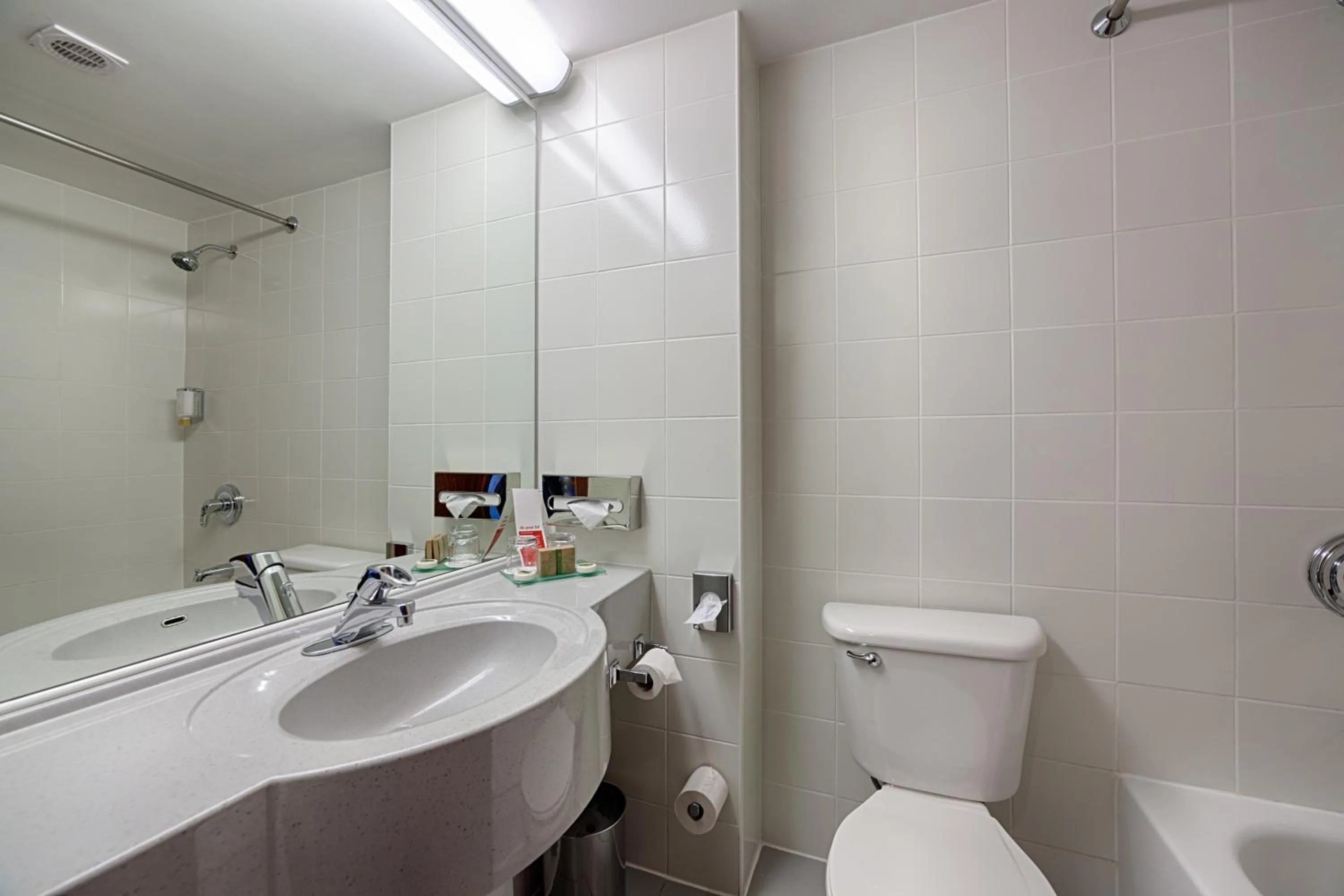 Bathroom in Ramada by Wyndham Bucharest Parc Hotel