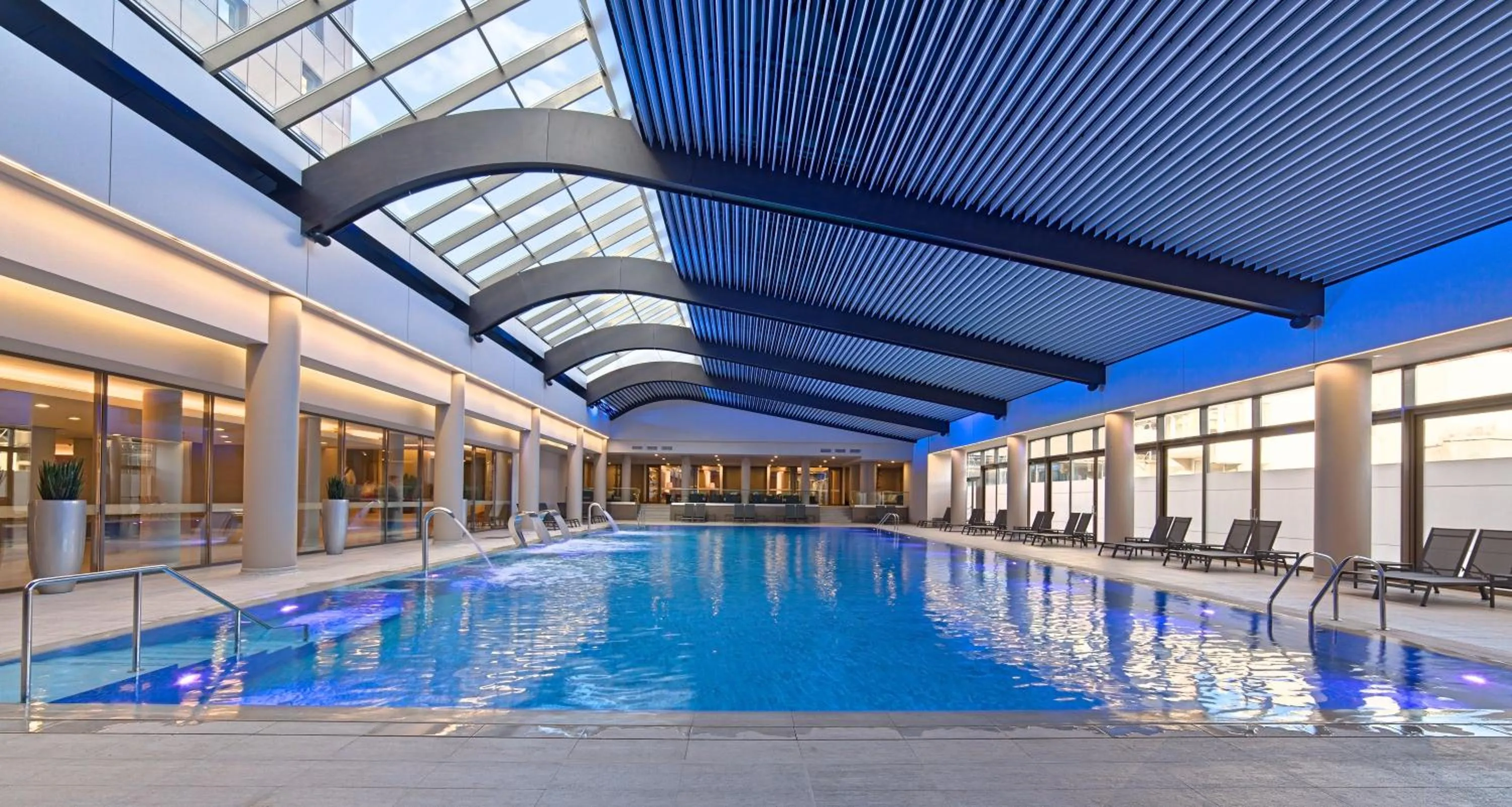 Swimming pool in Ramada by Wyndham Bucharest Parc Hotel