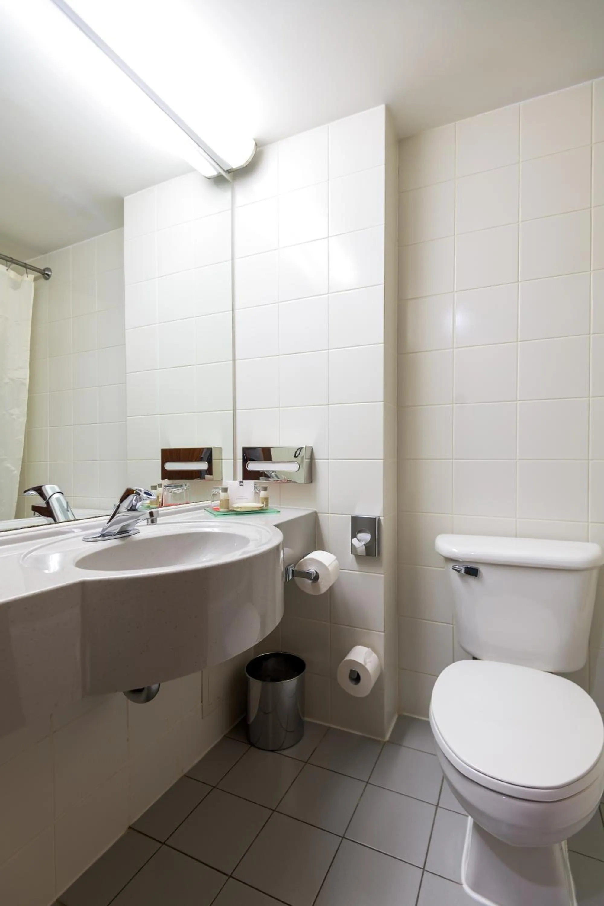 Bathroom in Ramada by Wyndham Bucharest Parc Hotel