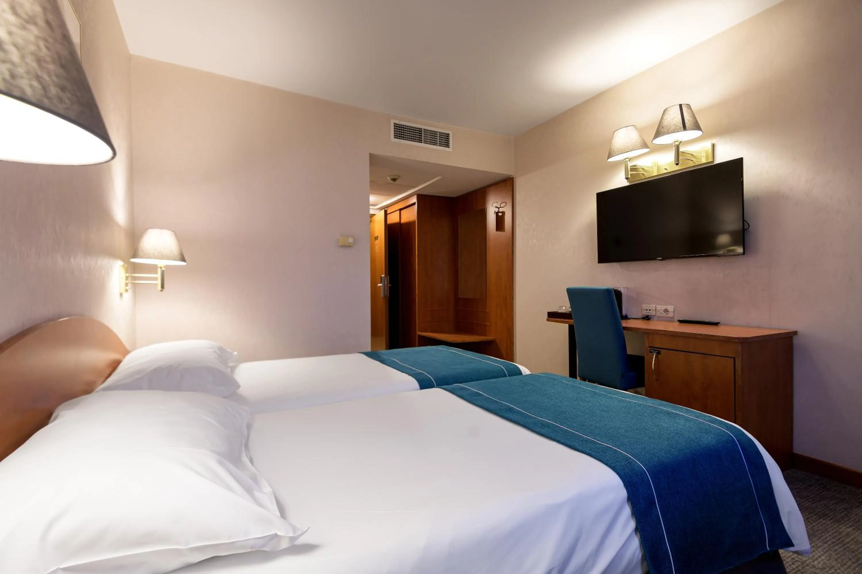 Photo of the whole room in Ramada by Wyndham Bucharest Parc Hotel