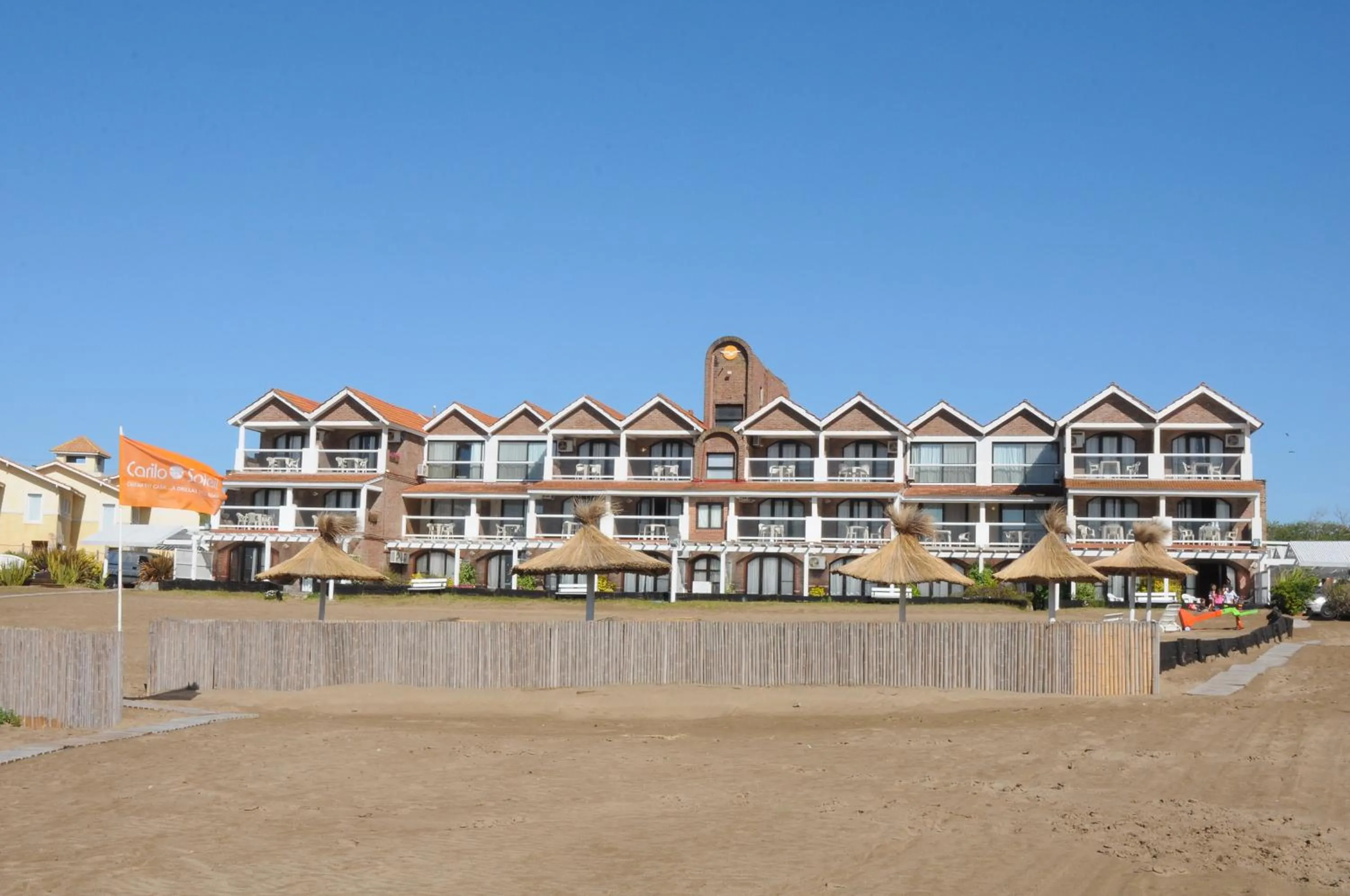 Facade/entrance in Carilo Soleil By HS