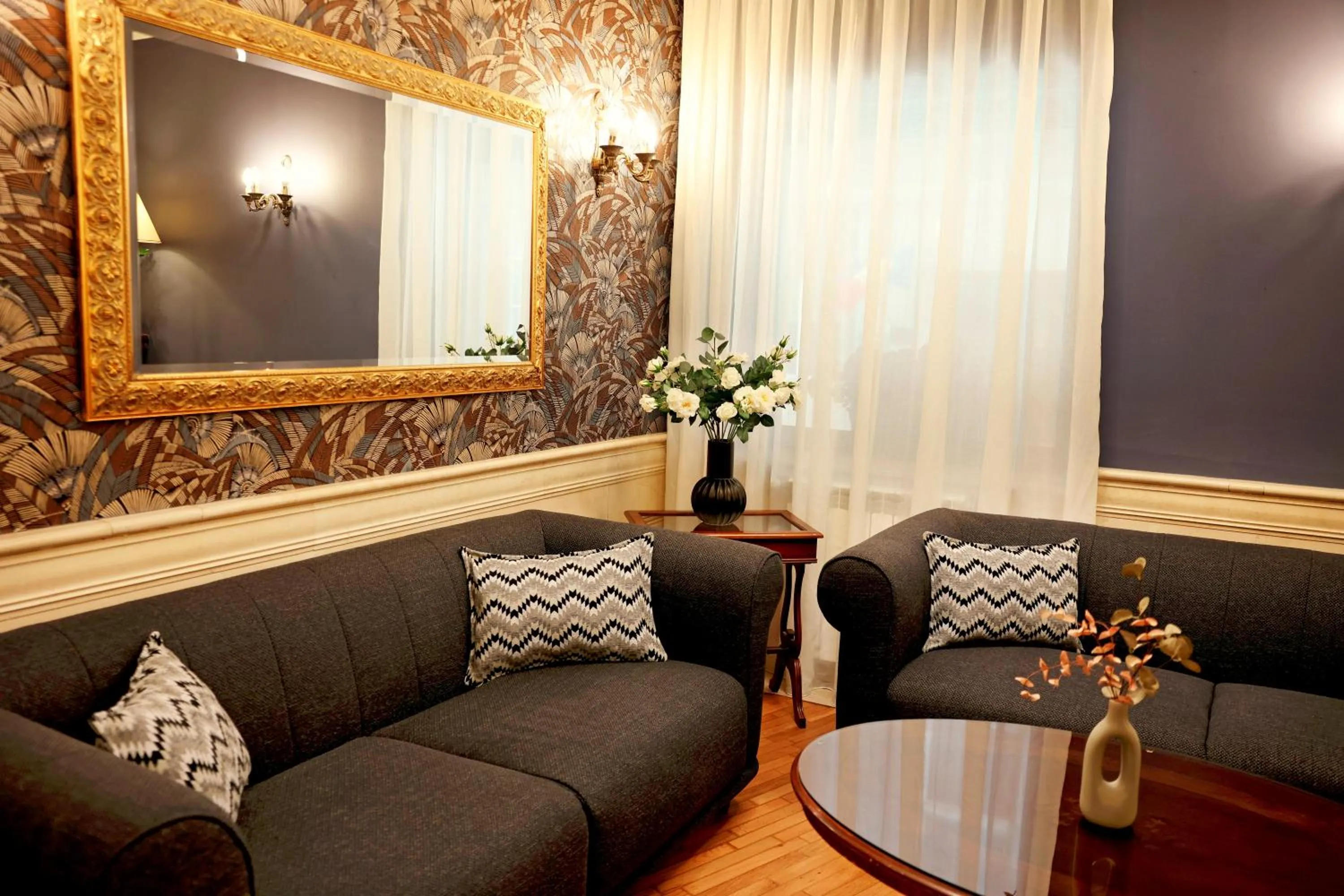 Seating area in Zeus Essence Bucharest Opera