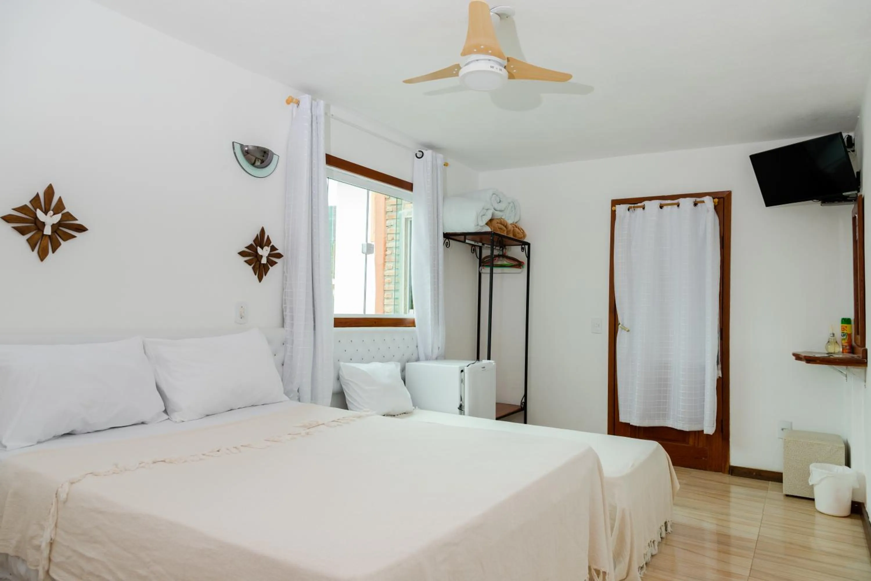 Bed in Pousada Brilho da Serra