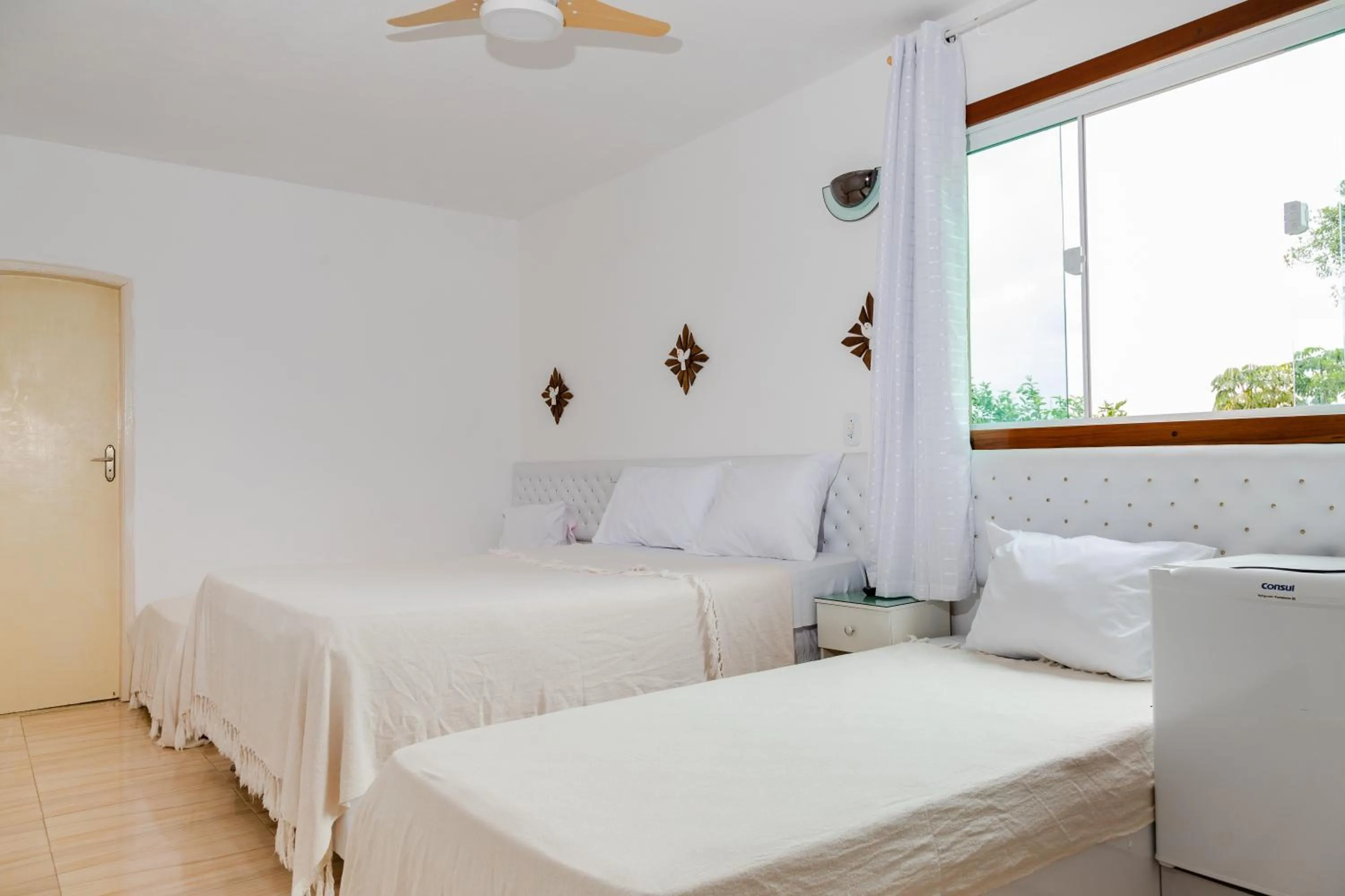 Bed in Pousada Brilho da Serra