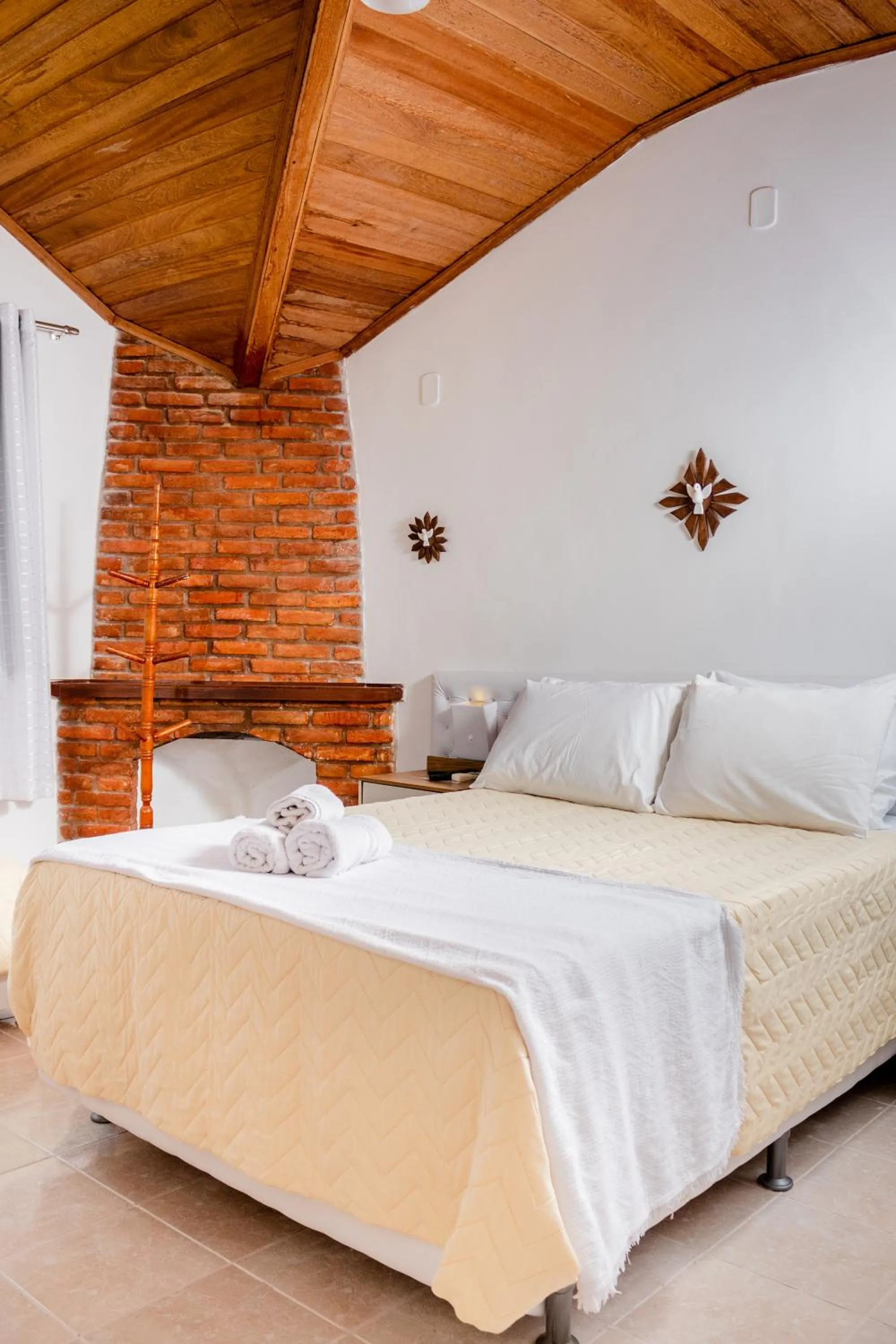 Bed in Pousada Brilho da Serra