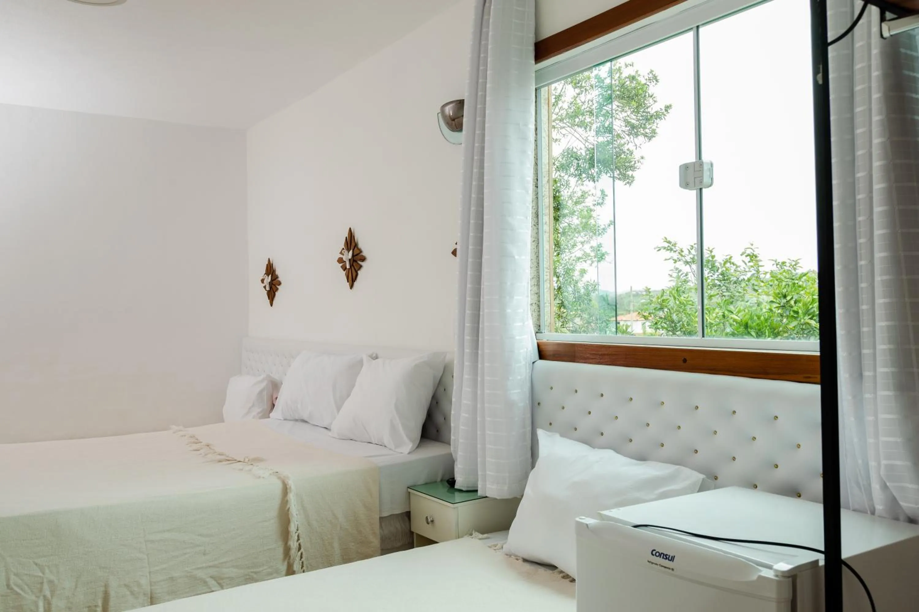 Bed in Pousada Brilho da Serra