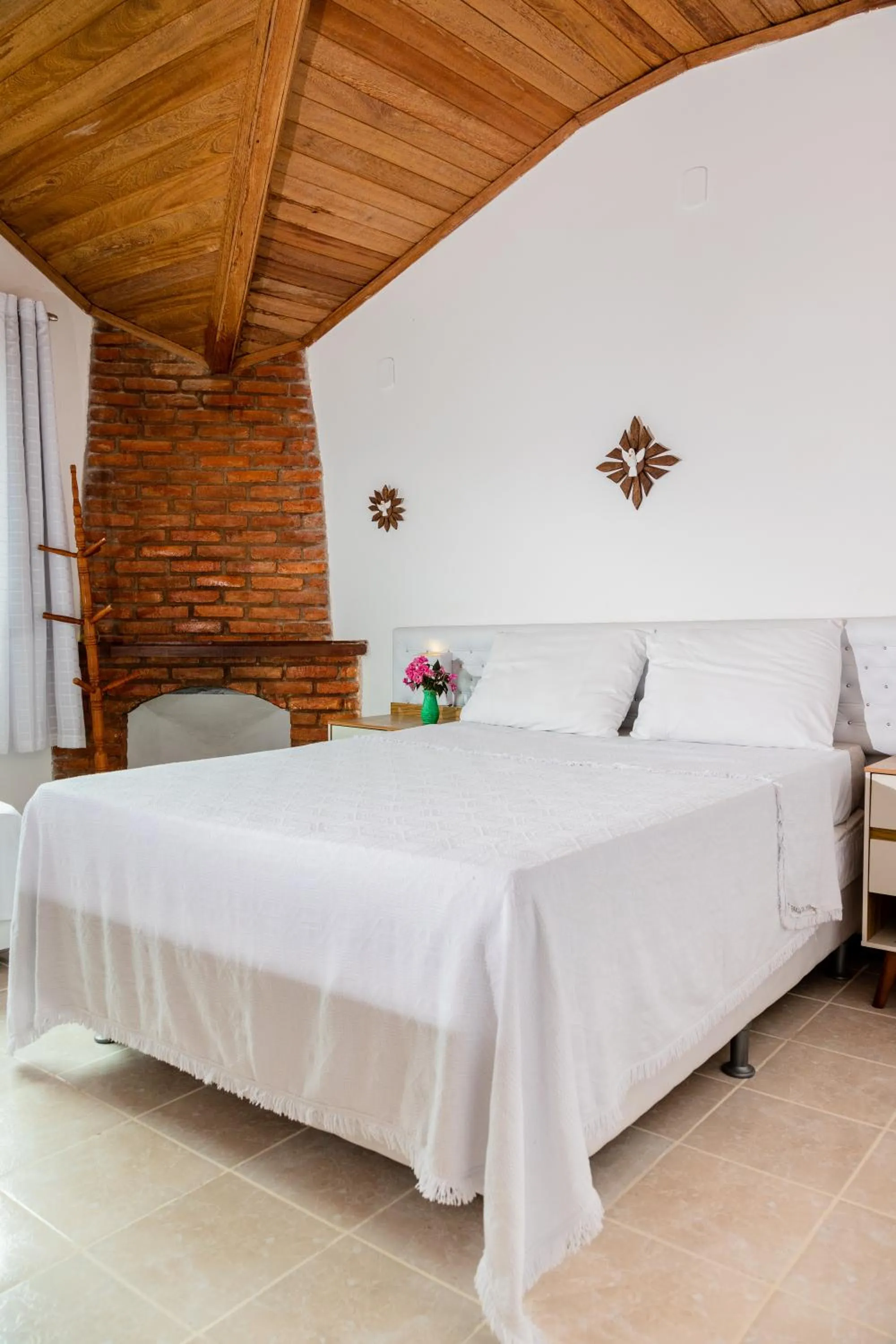 Bed in Pousada Brilho da Serra