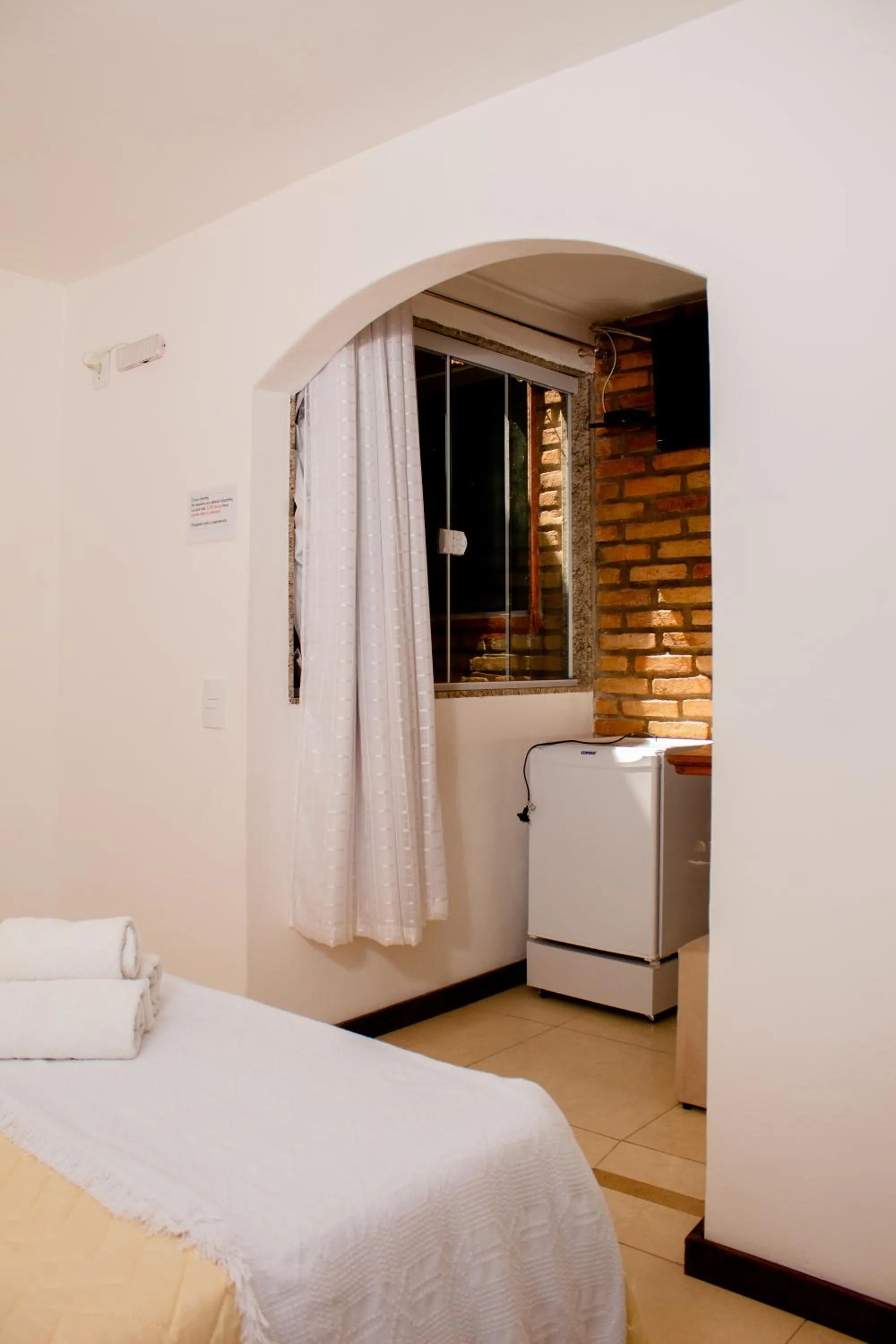 Bed in Pousada Brilho da Serra