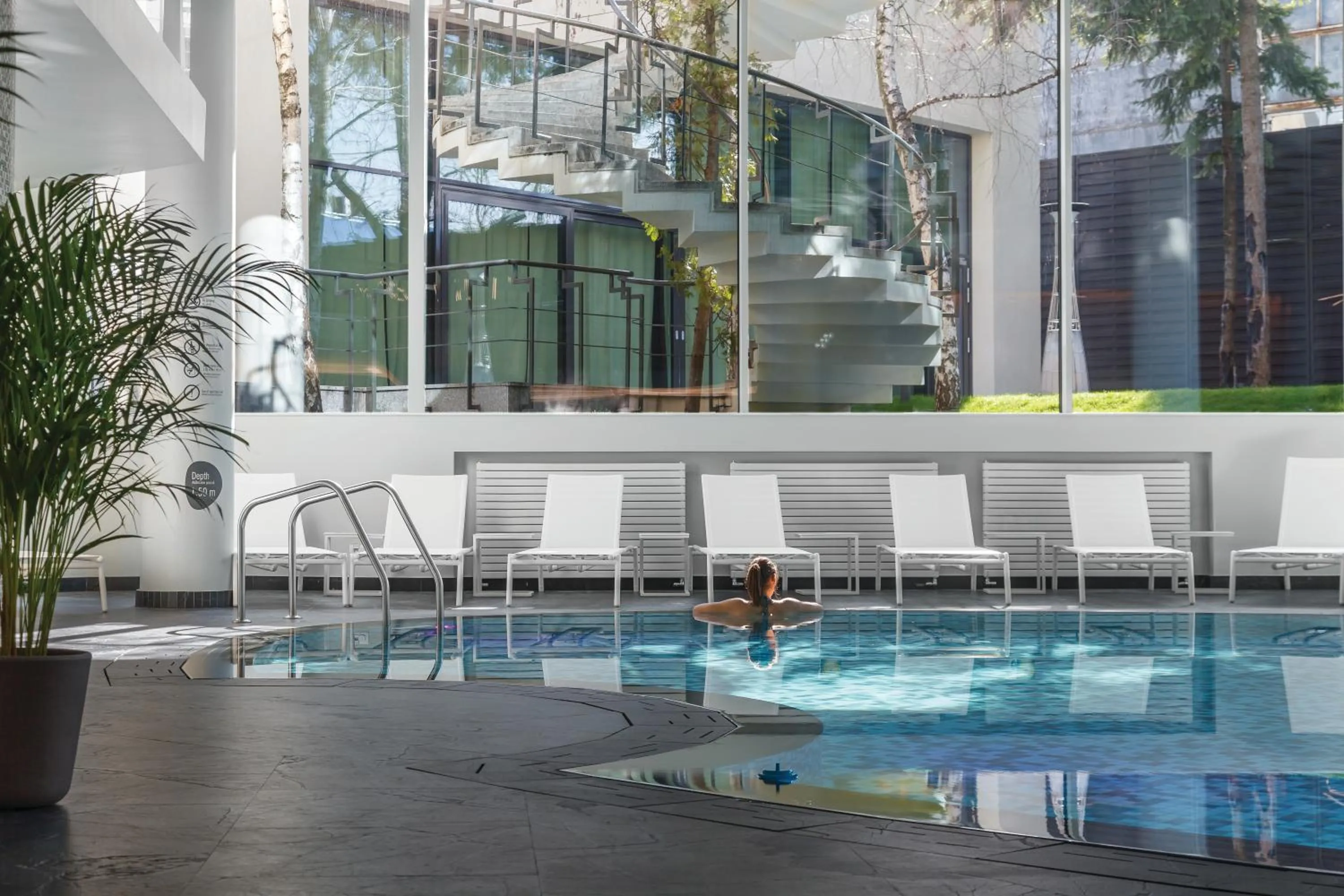 Swimming pool in Crowne Plaza Bucharest by IHG