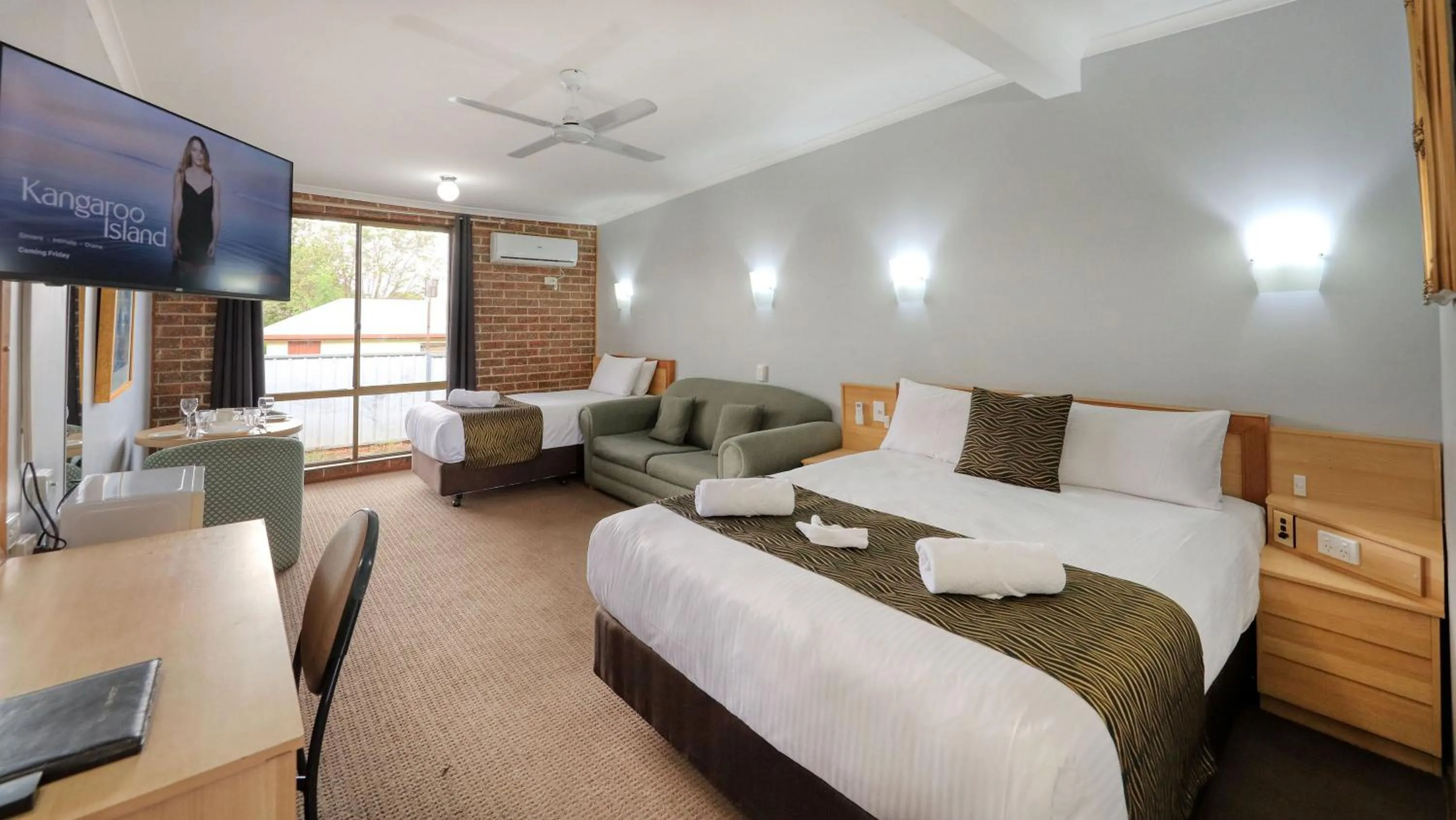 Bed in Moonraker Motor Inn