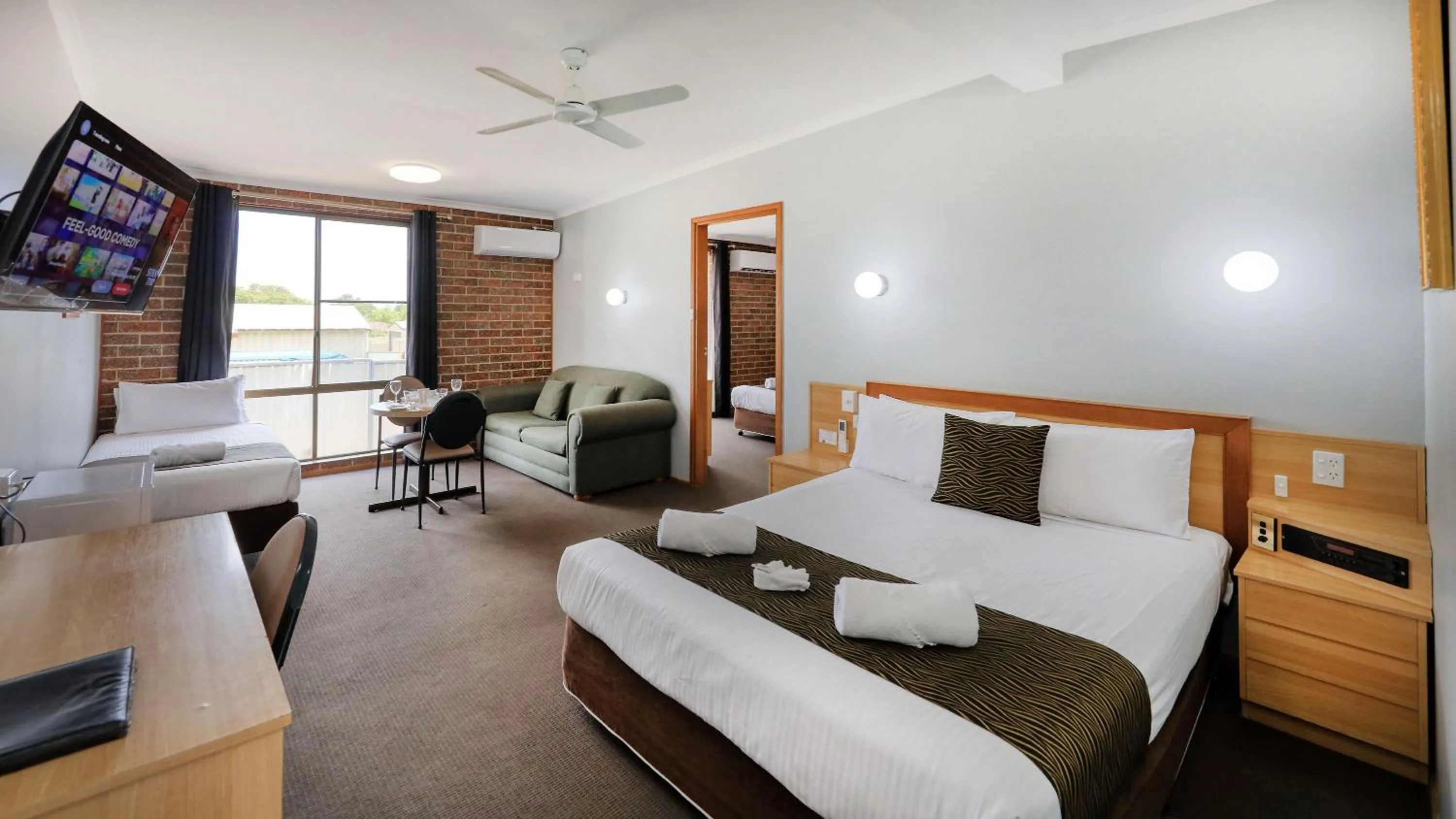 Bed in Moonraker Motor Inn