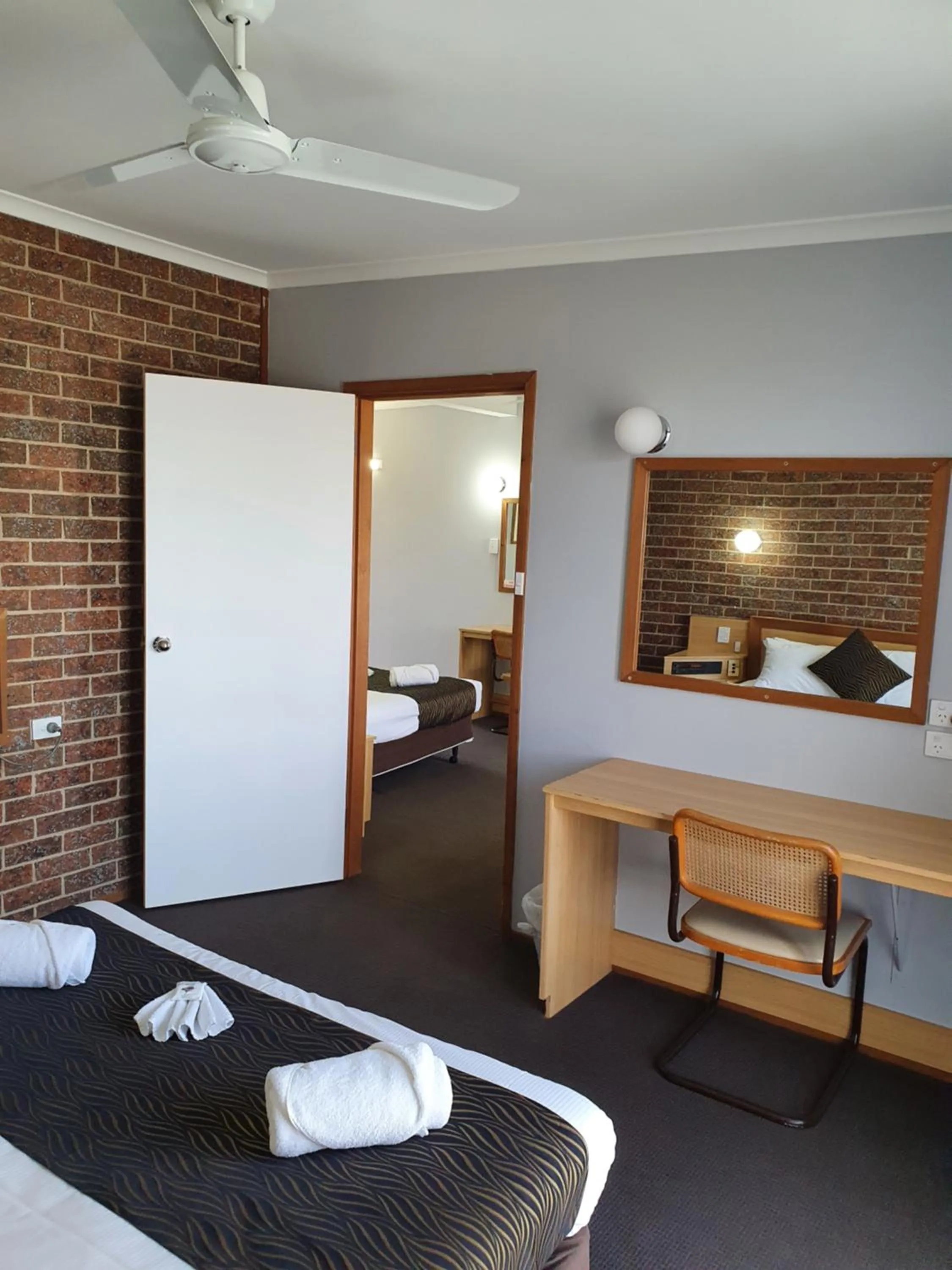 Bed in Moonraker Motor Inn