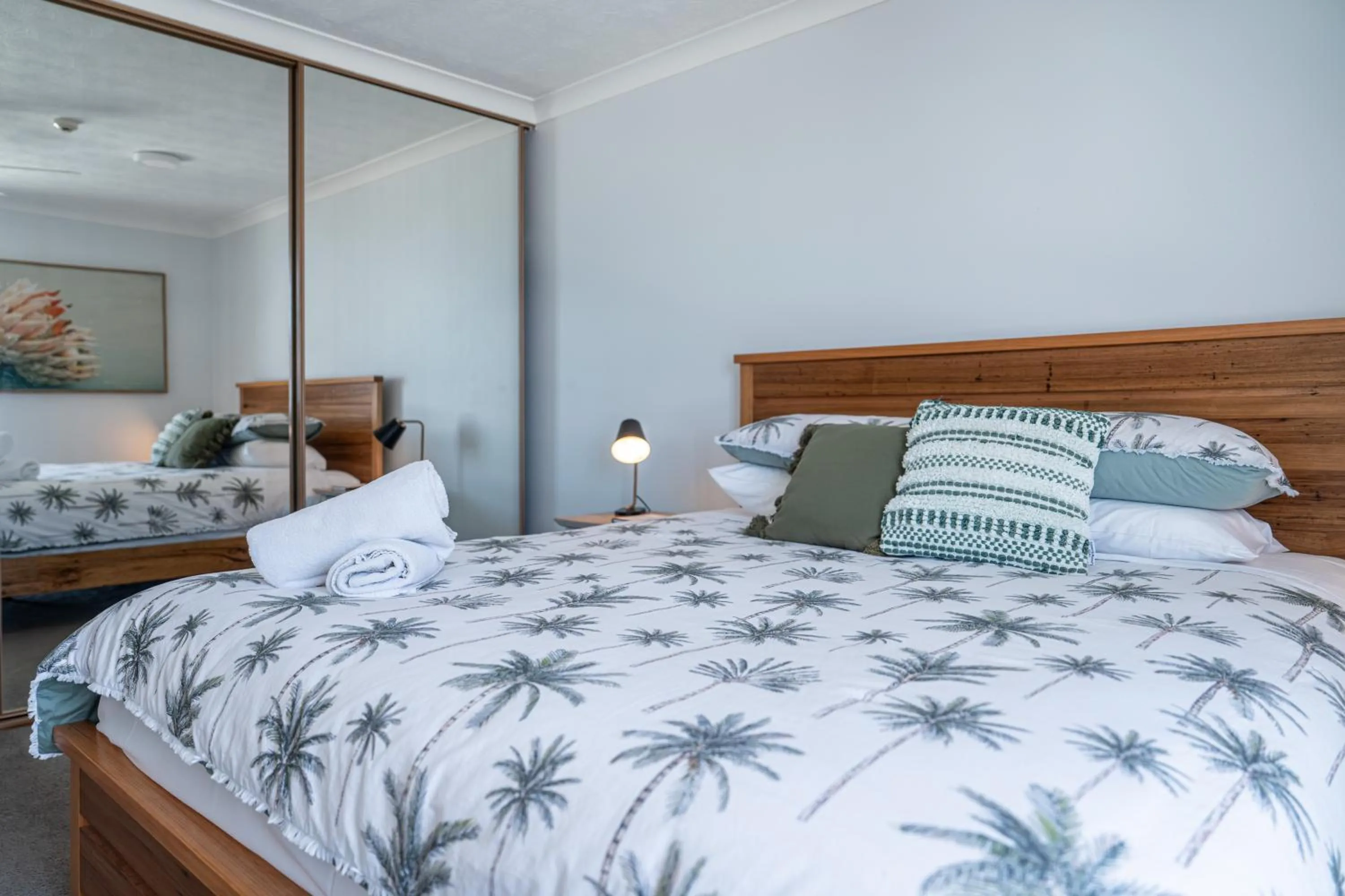 Bed in Beach Palms Holiday Apartments