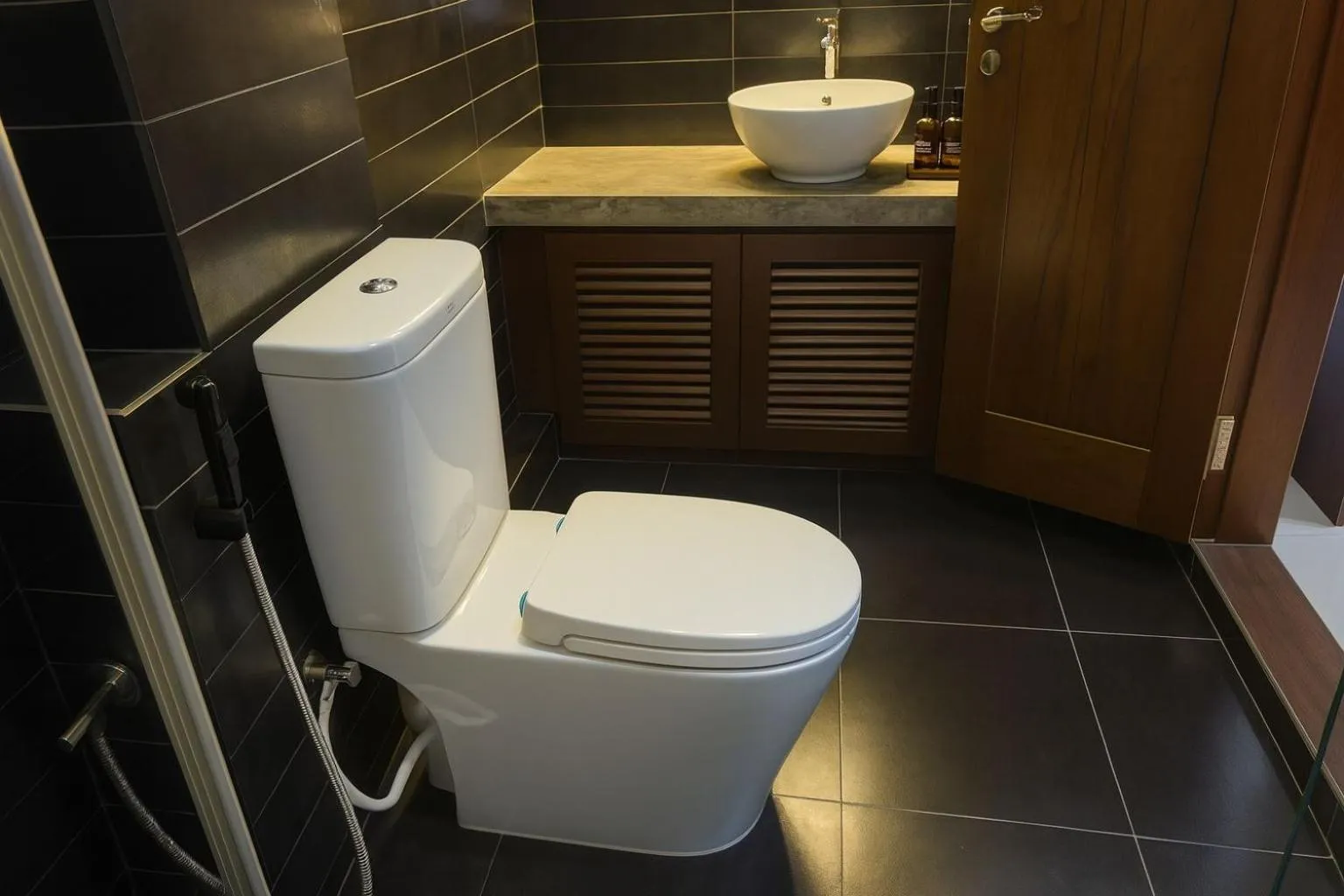 Toilet in Unique Towers Luxury Boutique Suites