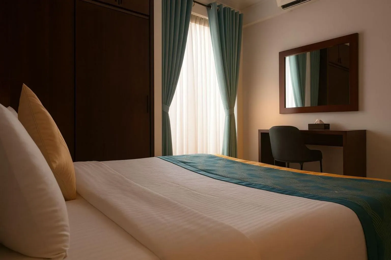 Bed in Unique Towers Luxury Boutique Suites