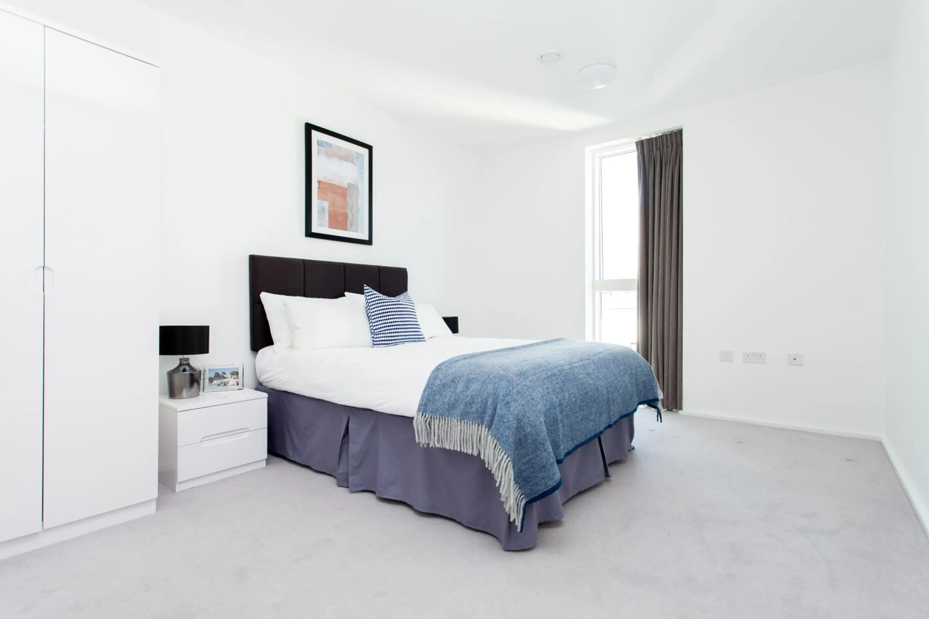 Bed in Clover Court by Aeria Apartments