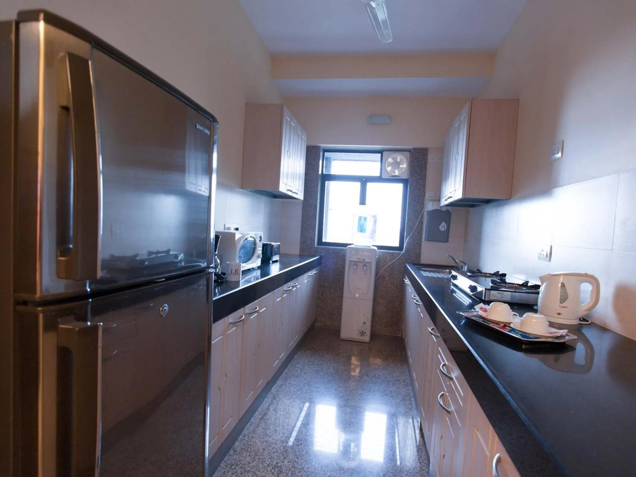Kitchen or kitchenette in Lalco Residency