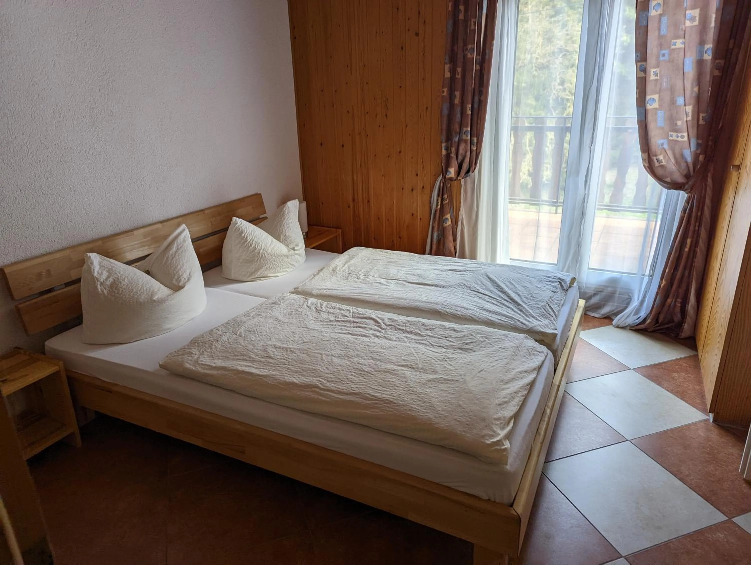 Bed in Hotel Pension Winzerhaus