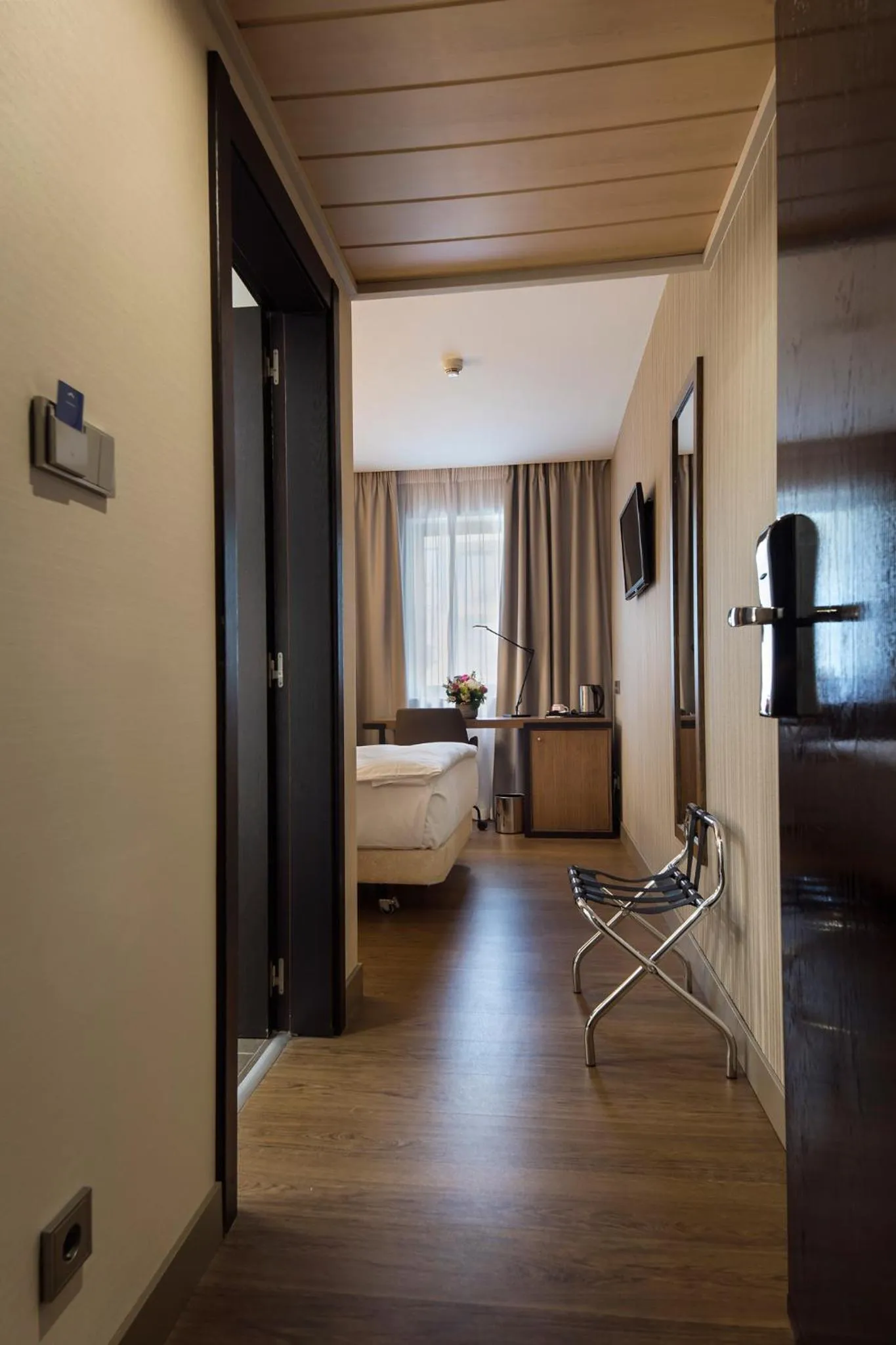 Living room, Bed in Hotel CH Bucharest