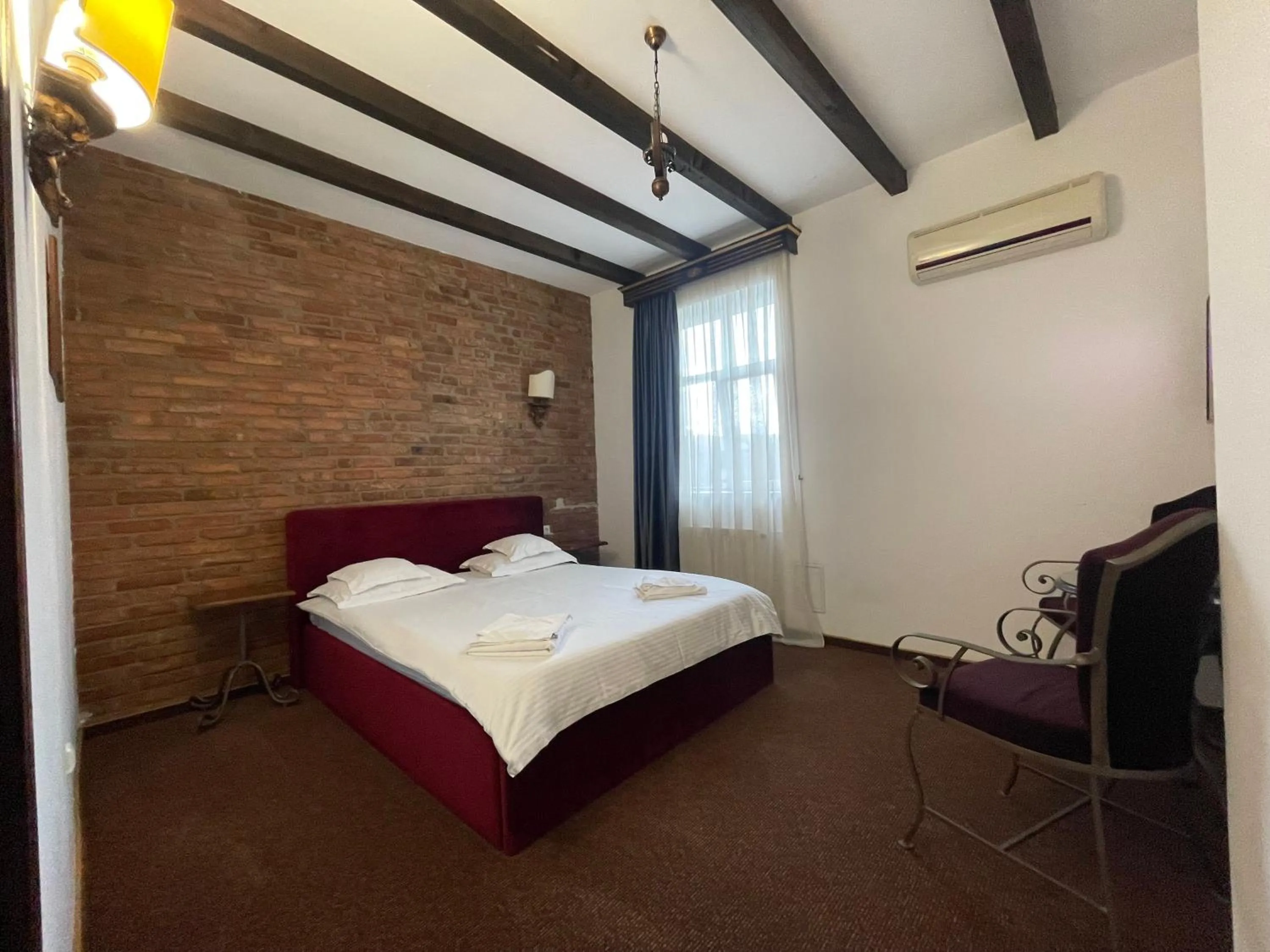 Bed in Topaz Boutique