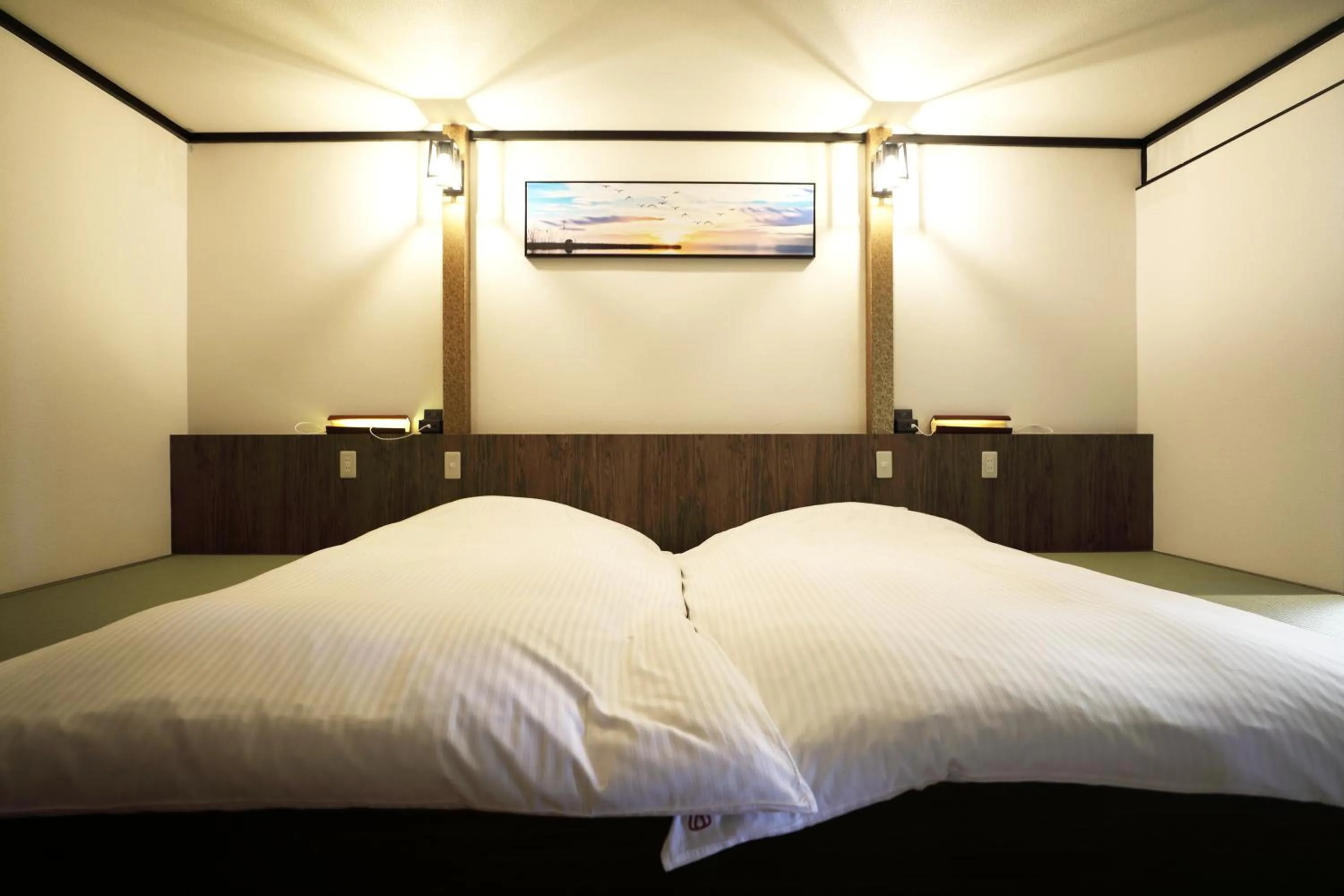 Bed in Inatori Akao Hotel