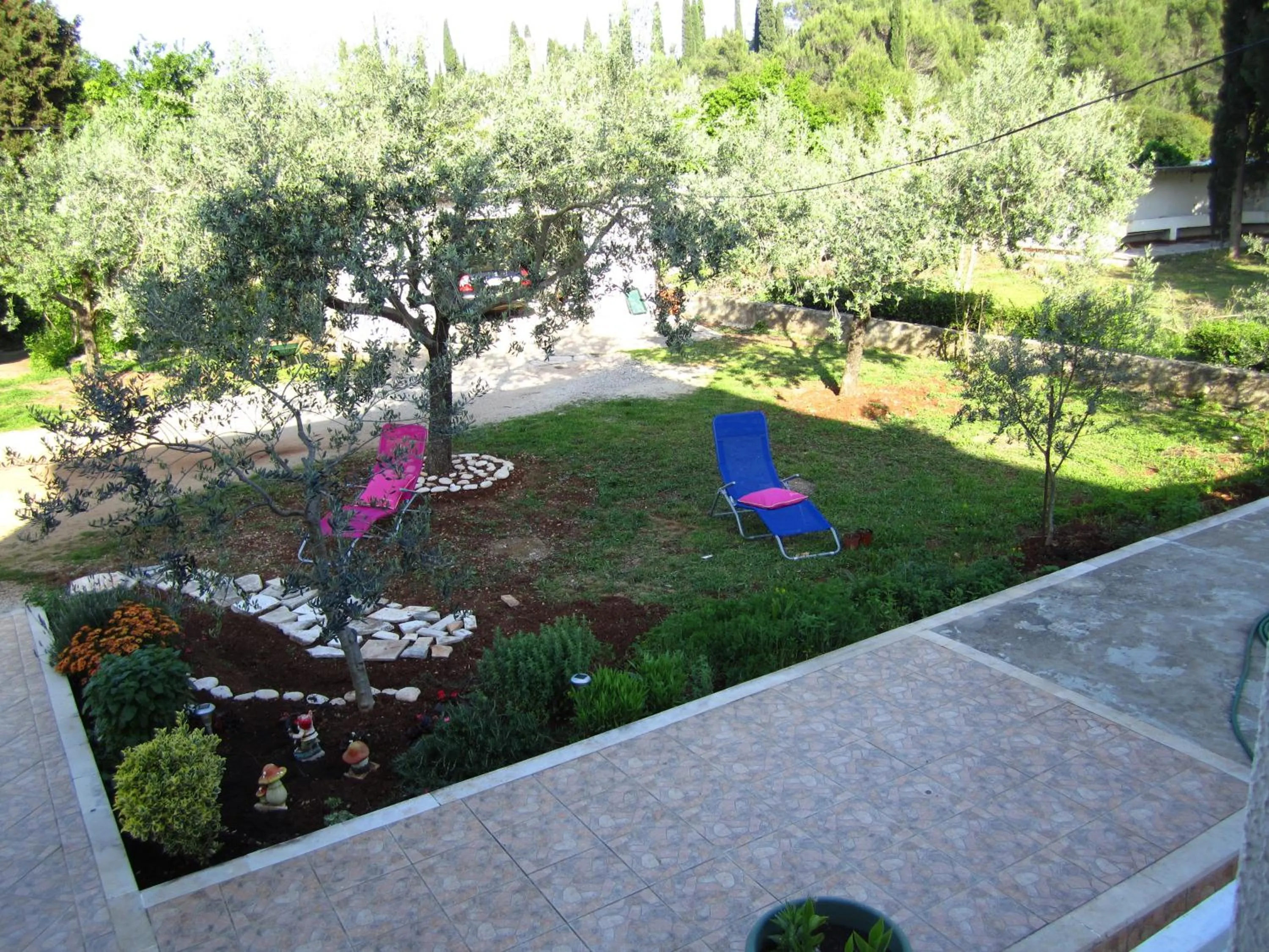Garden view in Apartments Biočić