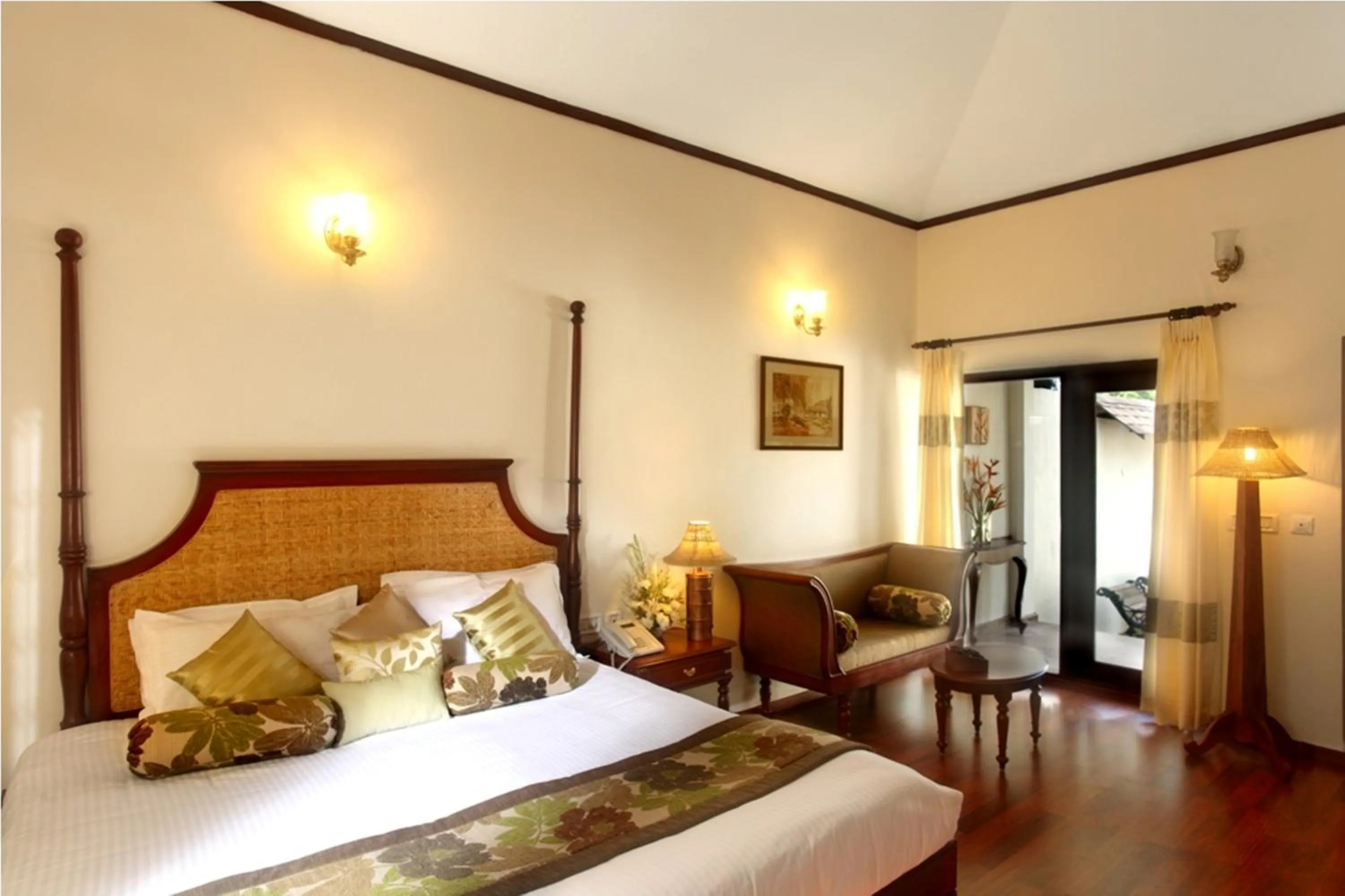 Bed in Carmelia Haven Resort Thekkady
