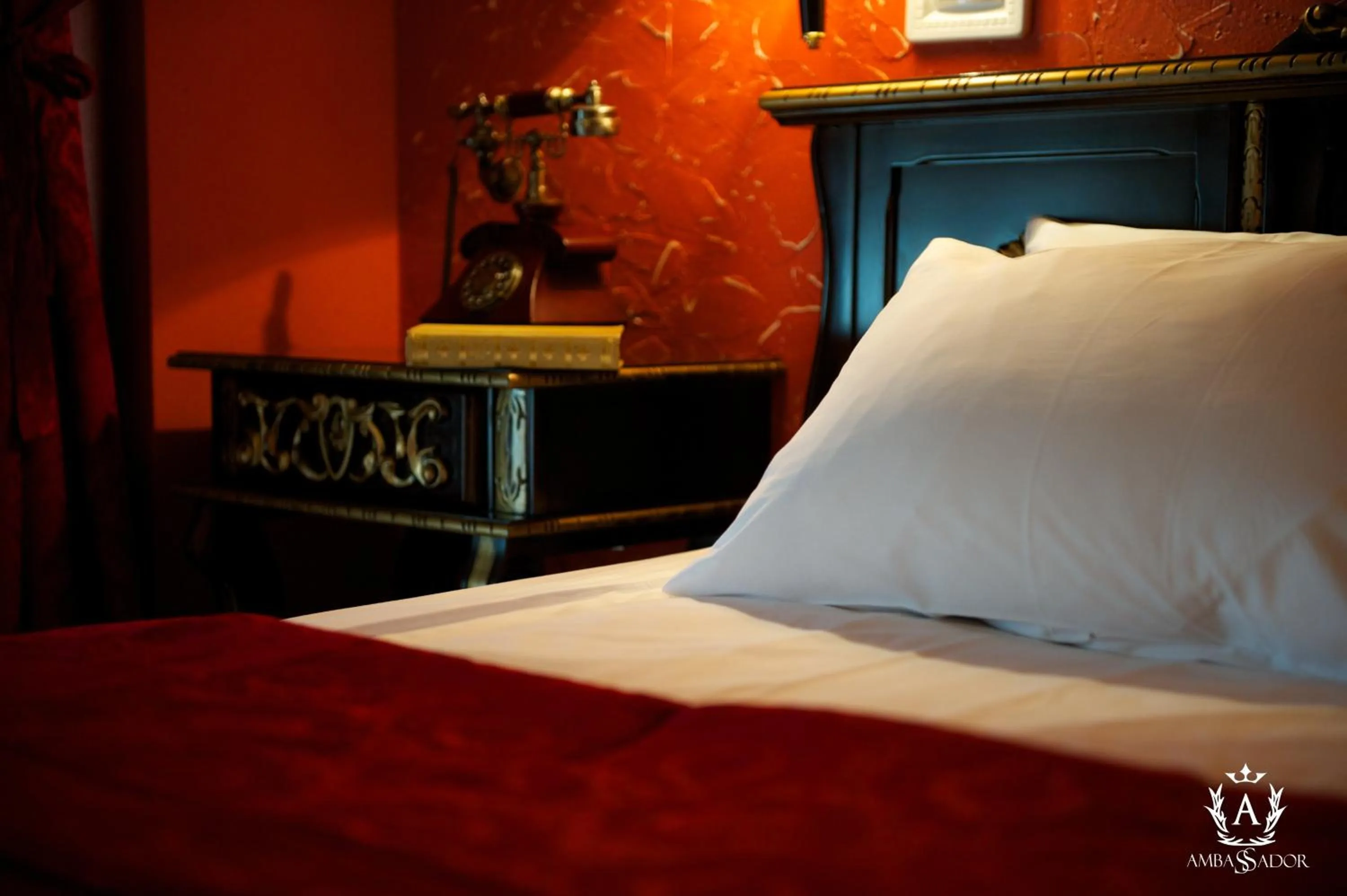 Bed in Ambassador Hotel