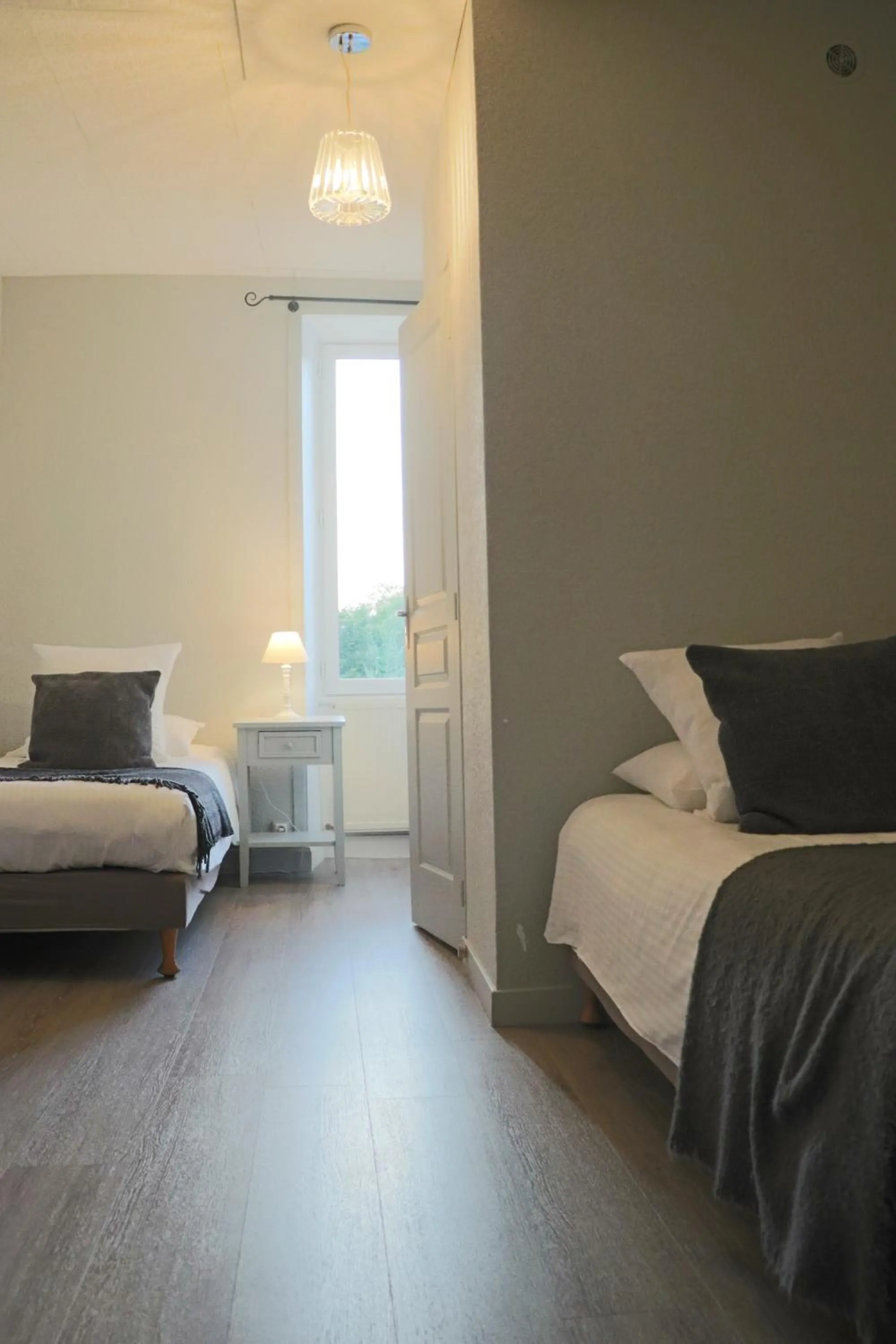 Bed in Logis Hôtel Restaurant La Brasserie