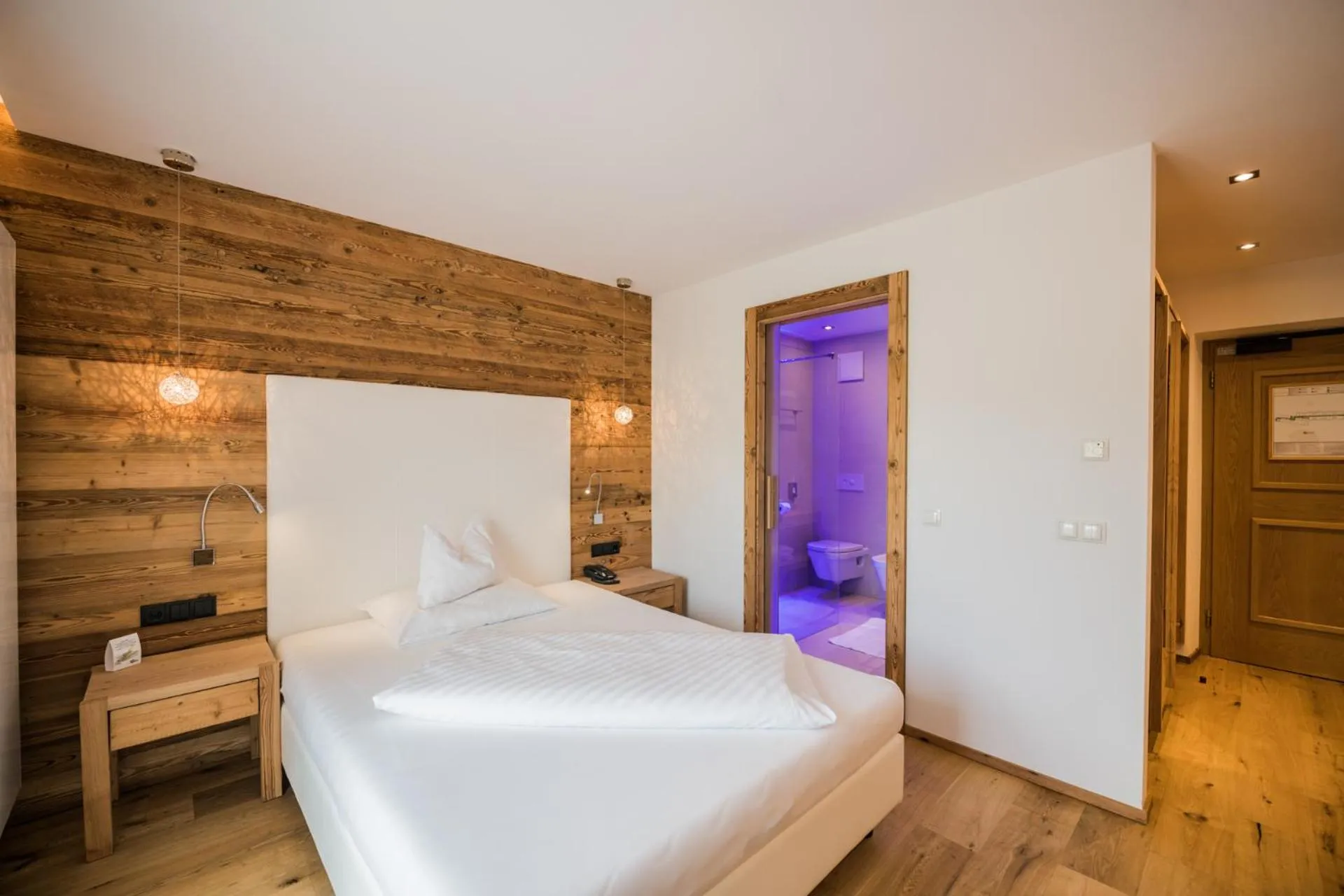 Photo of the whole room, Bed in Sporthotel Floralpina