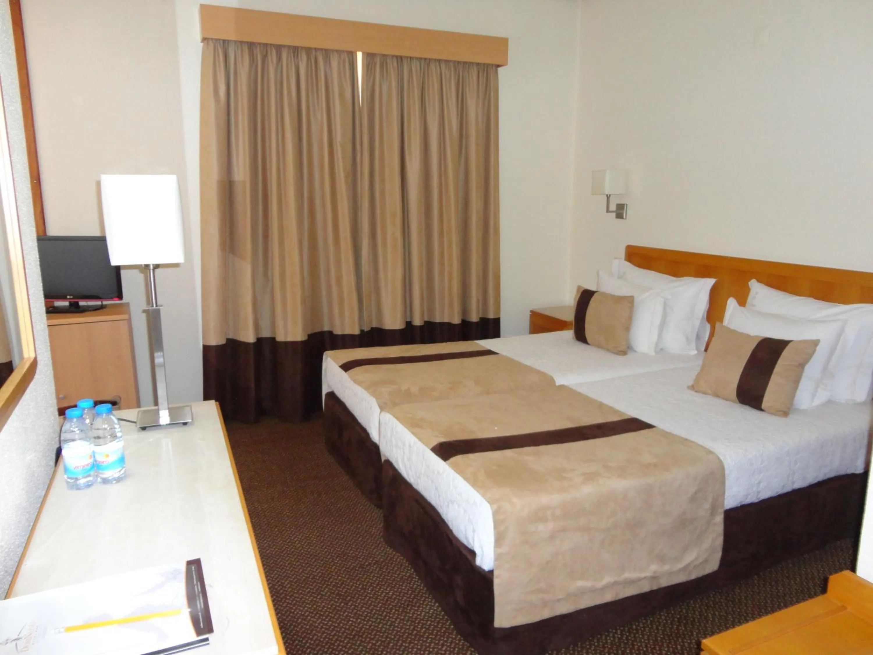 Bed in Hotel Dom Nuno