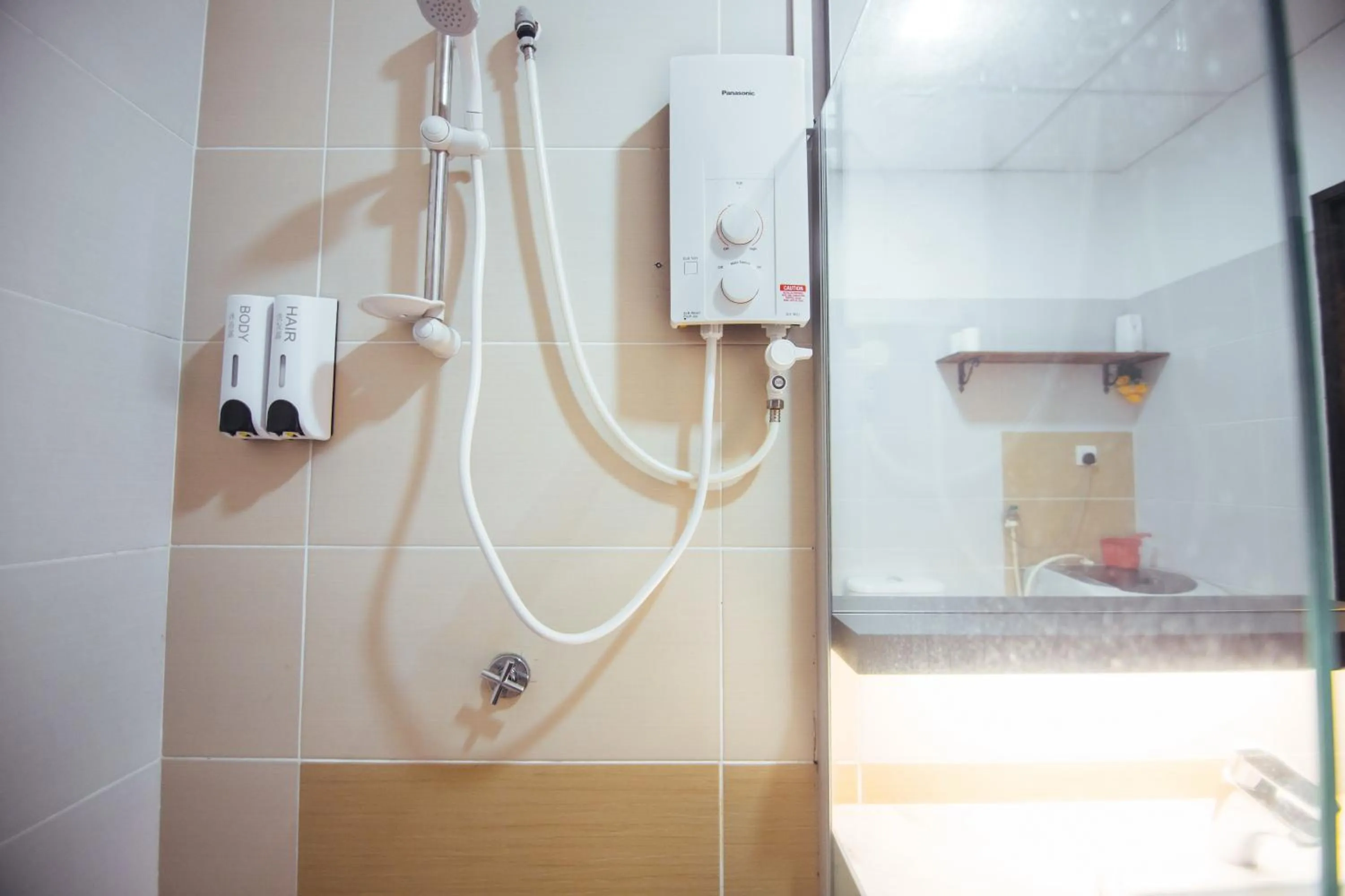 Bathroom in Akademik Suite by JK Home