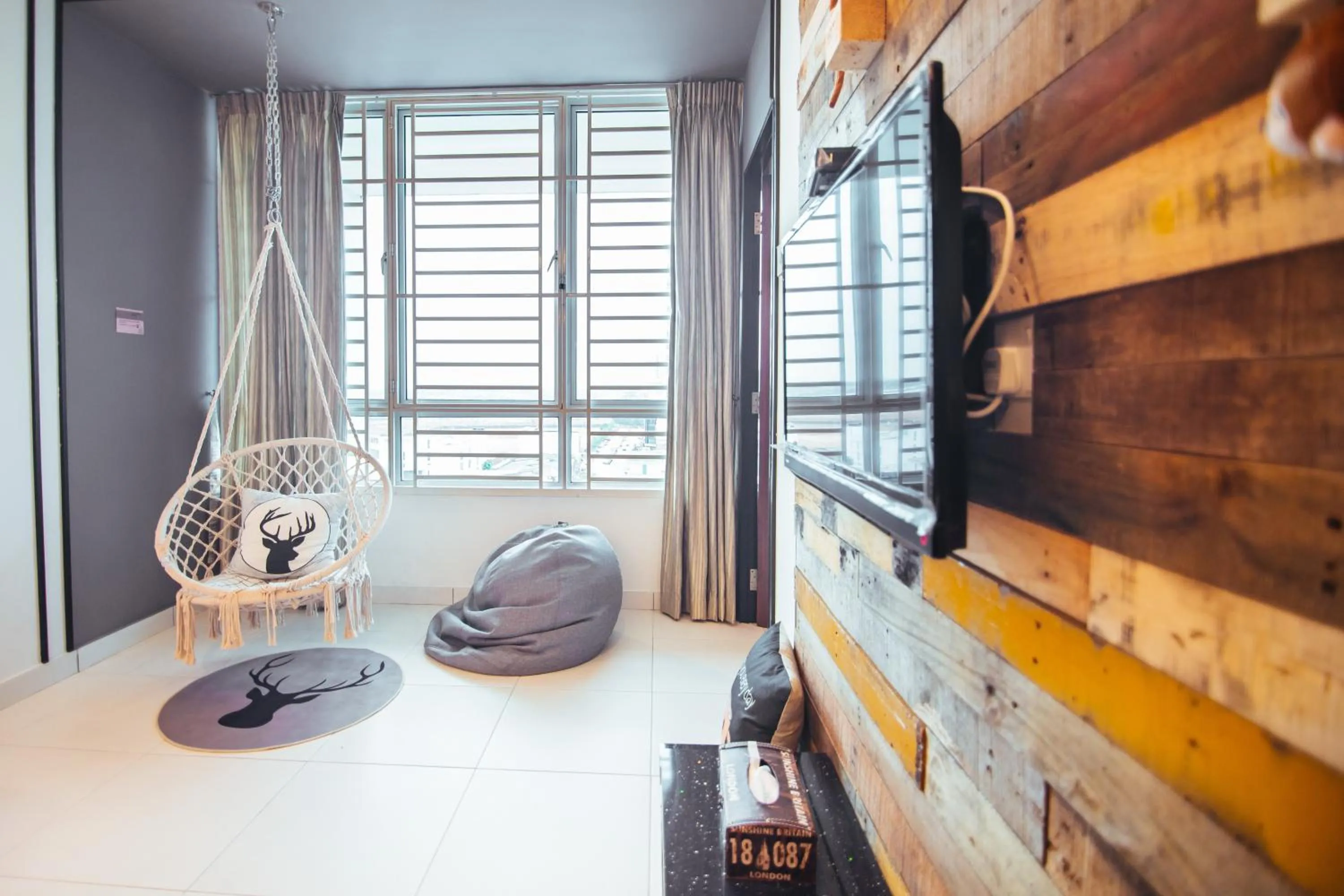 Living room, Bed in Akademik Suite by JK Home