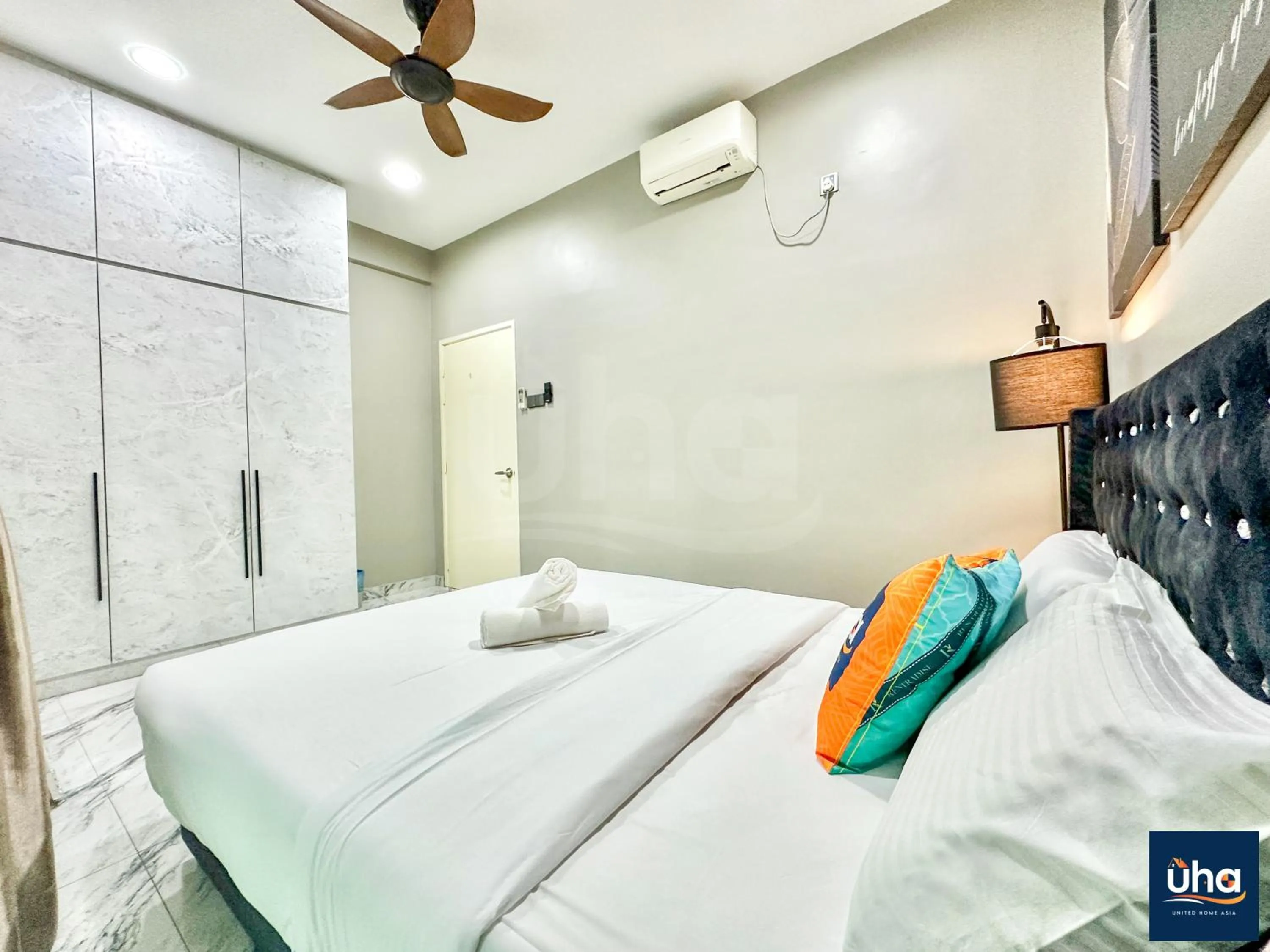 Bed in Akademik Suite by JK Home