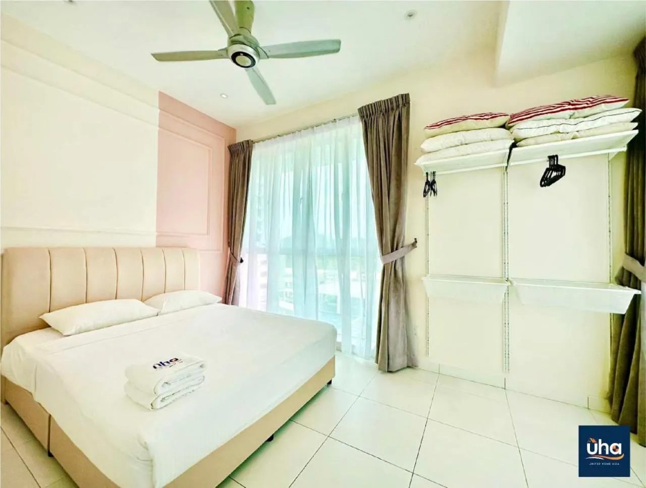 Bed in Akademik Suite by JK Home