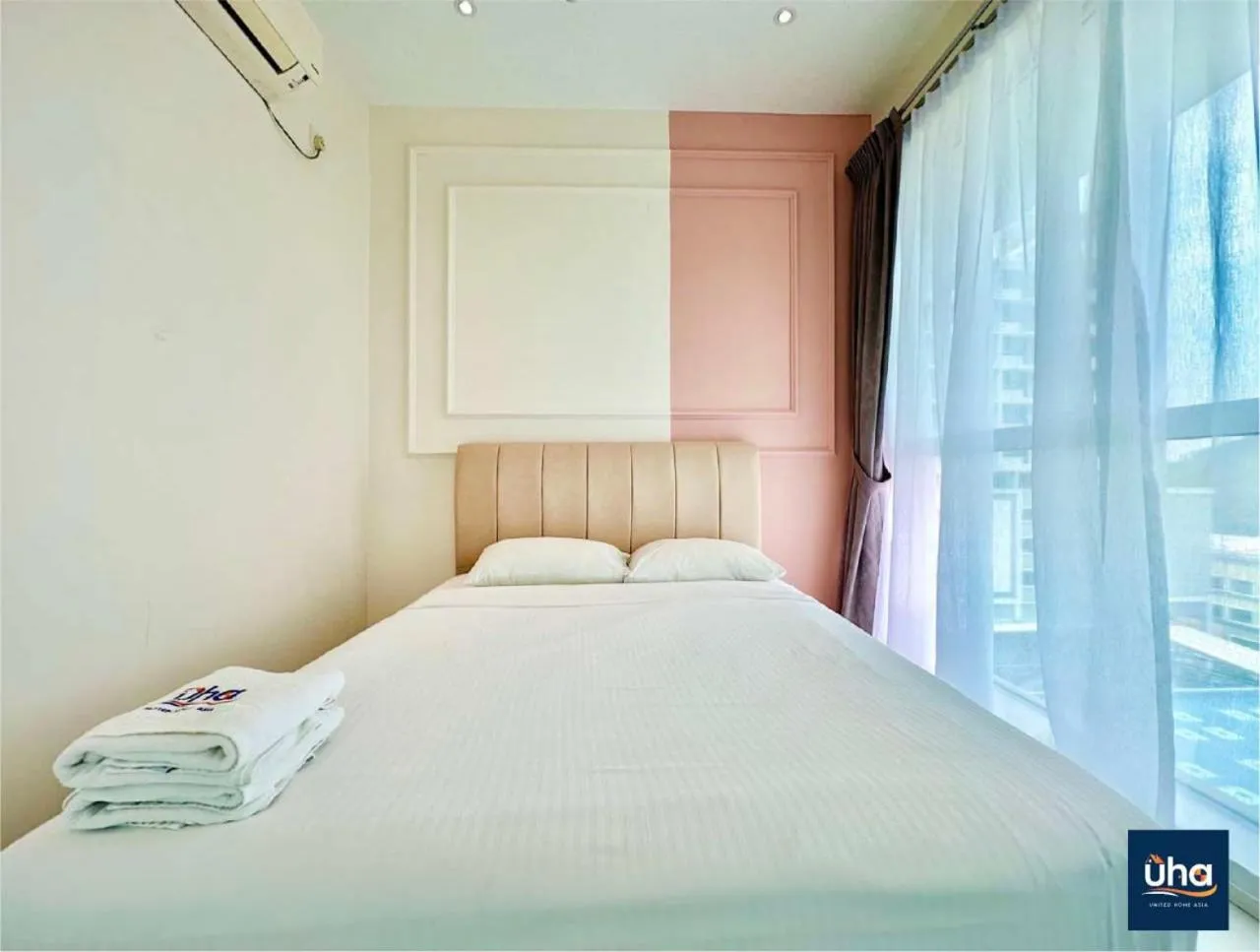 Bed in Akademik Suite by JK Home