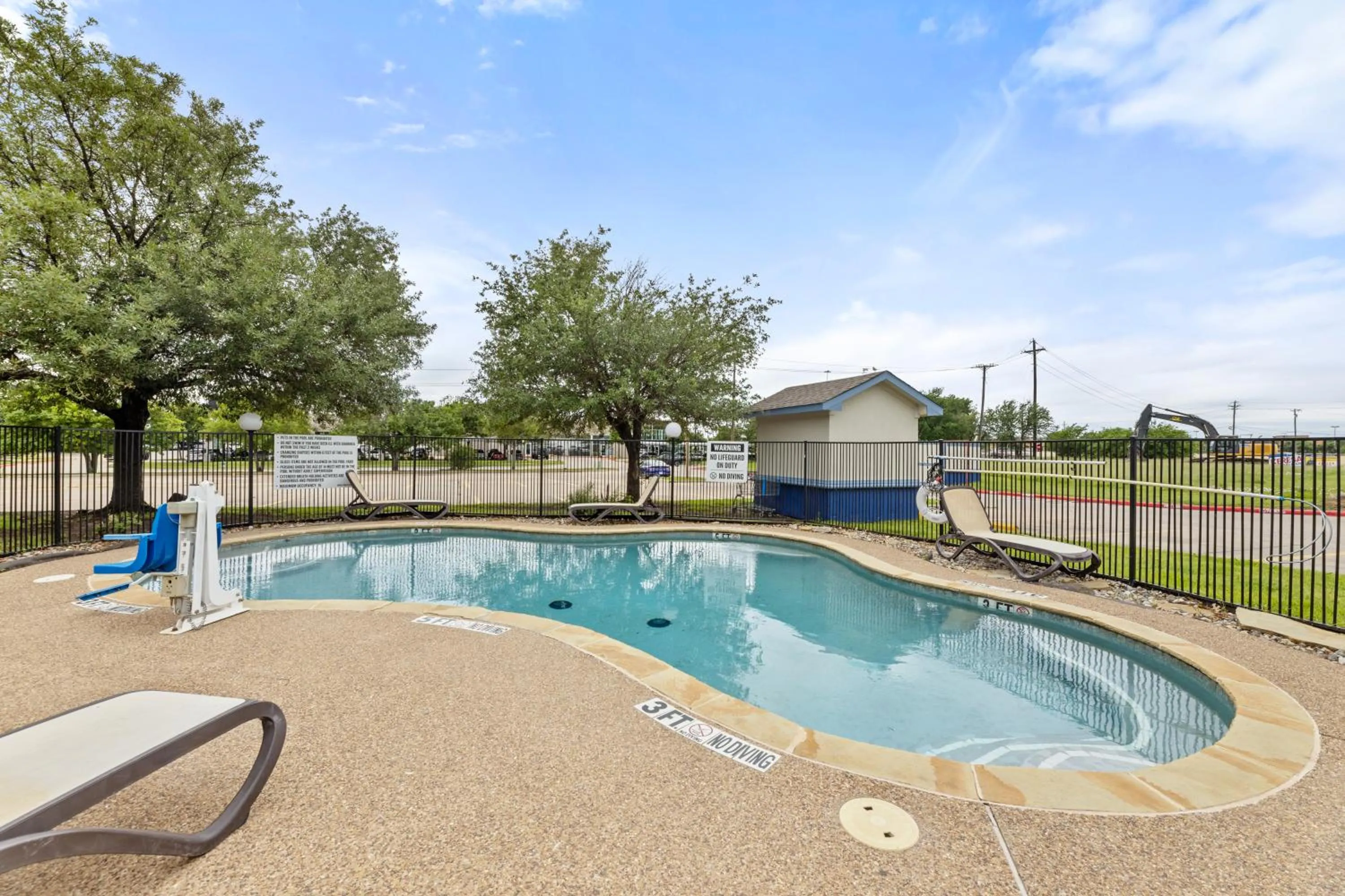 Swimming pool in Days Inn by Wyndham McKinney