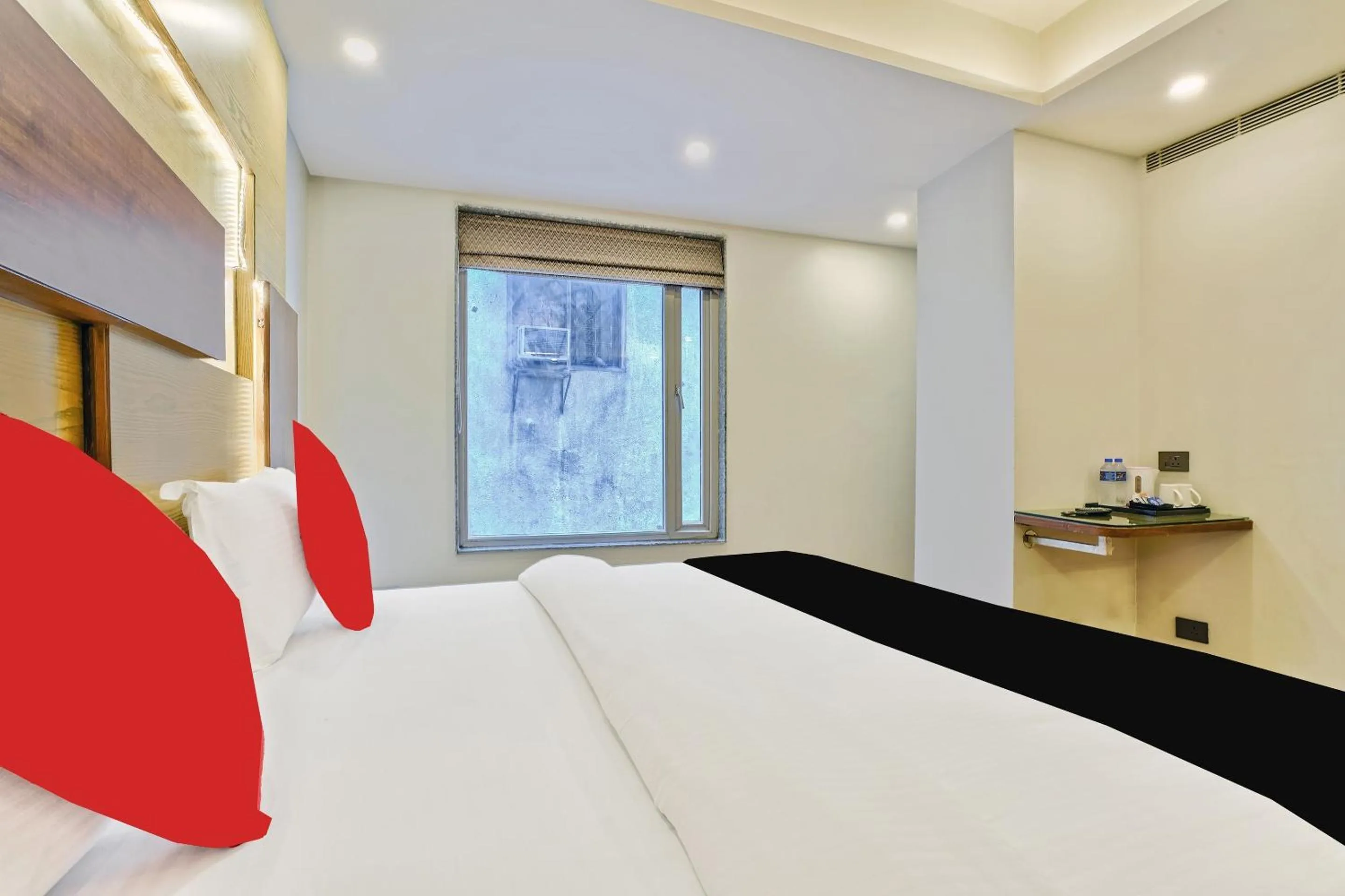 Bed in Staybook Hotel Nitya Maharani, Free Airport Pickup
