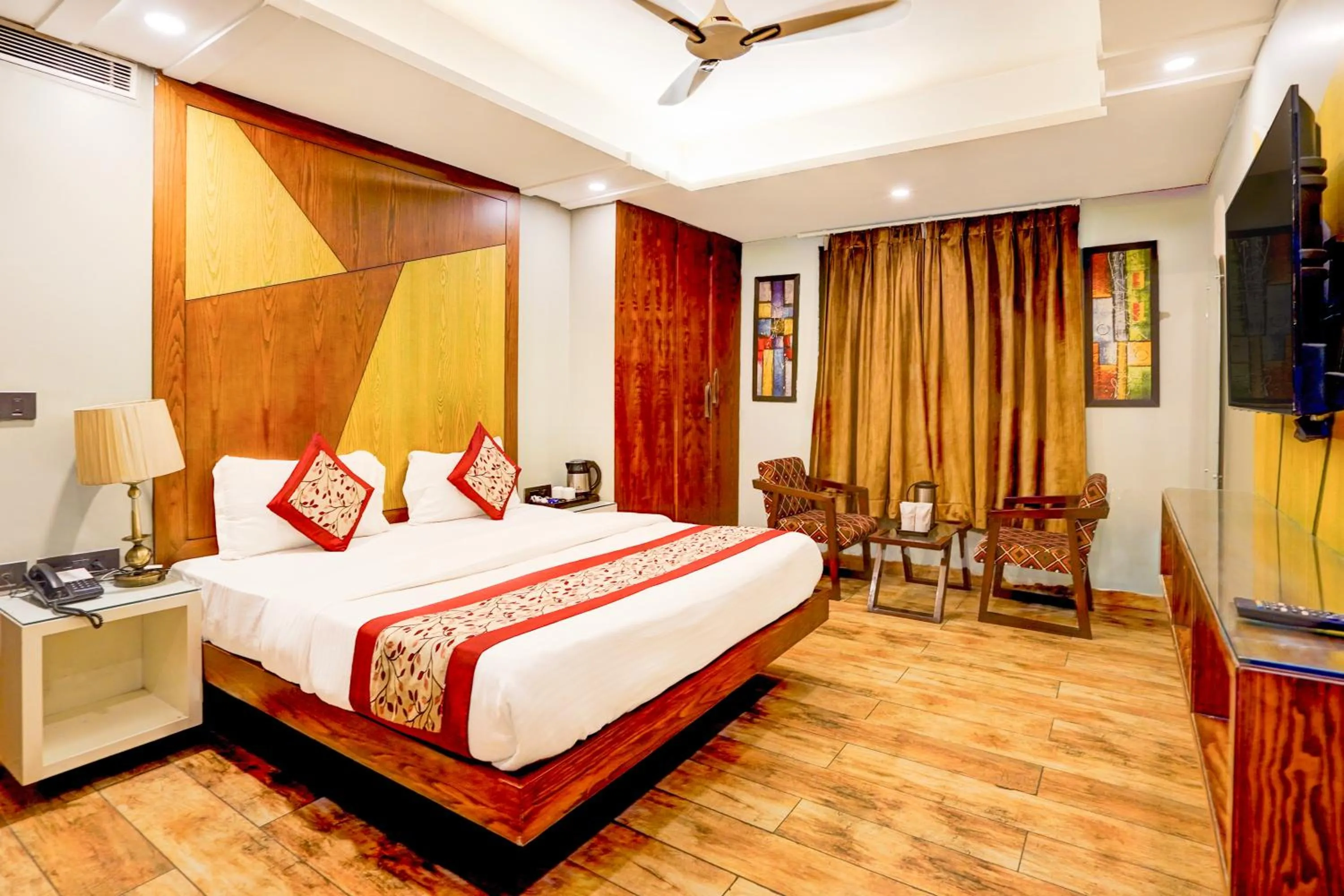 Bed in Staybook Hotel Nitya Maharani, Free Airport Pickup