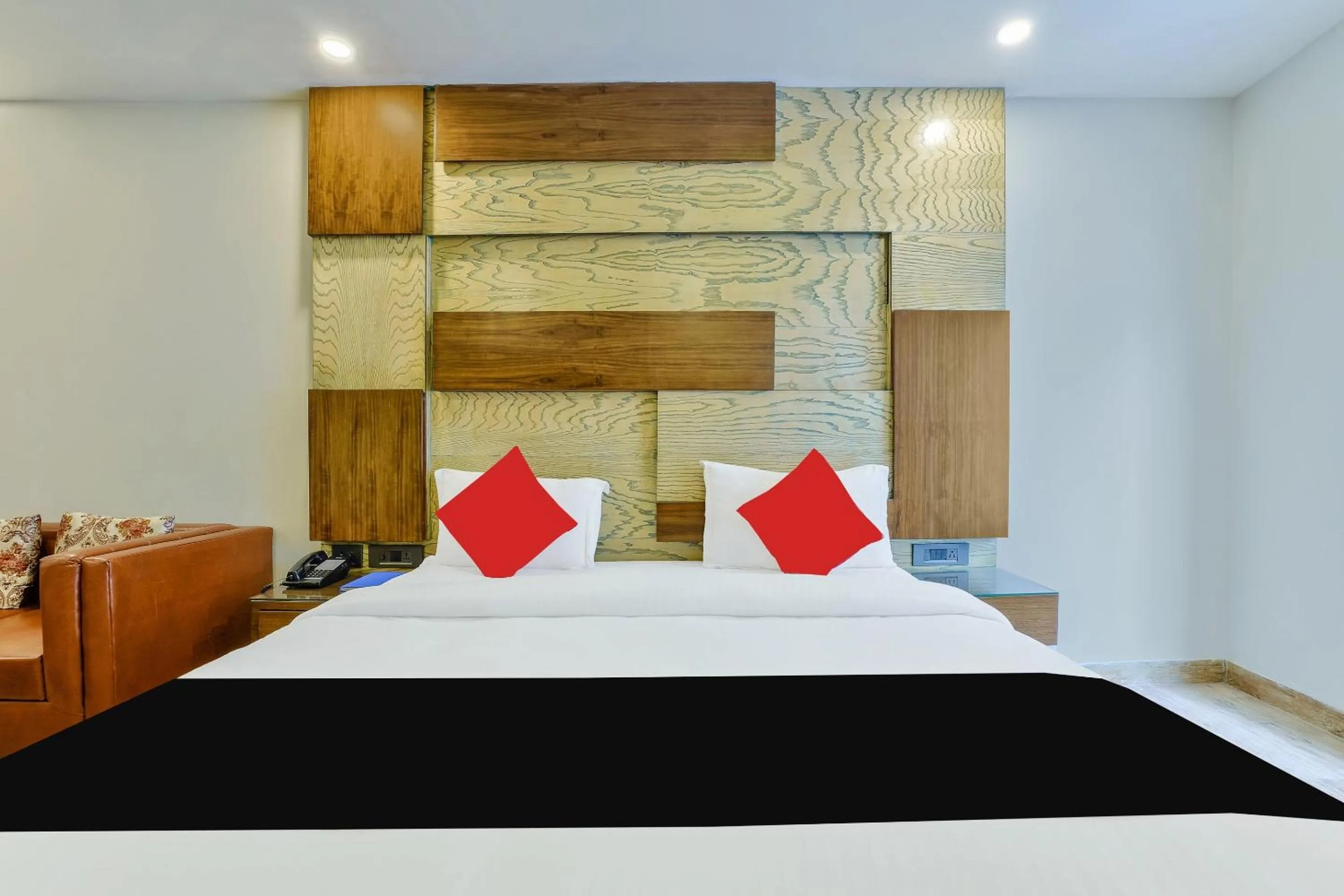 Bed in Staybook Hotel Nitya Maharani, Free Airport Pickup