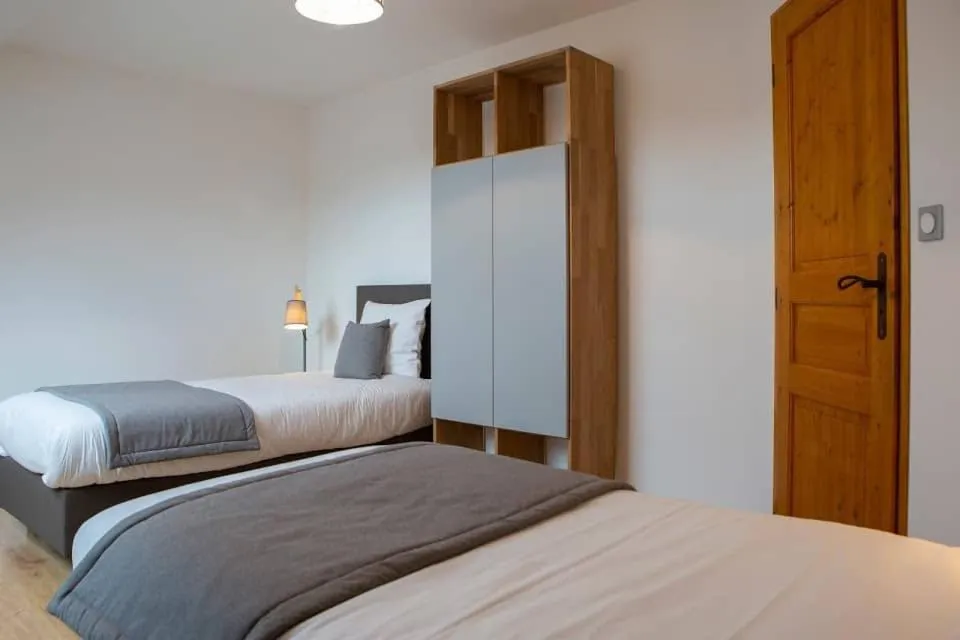 Bed in Gîtes de l'Orée du Bois - Boussières