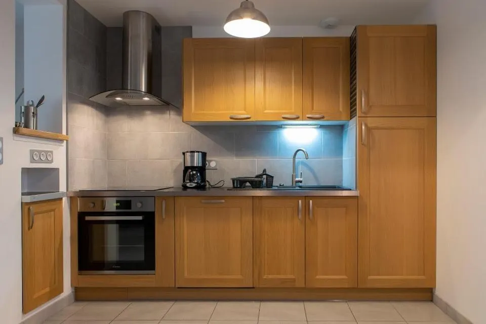 Kitchen or kitchenette in Gîtes de l'Orée du Bois - Boussières