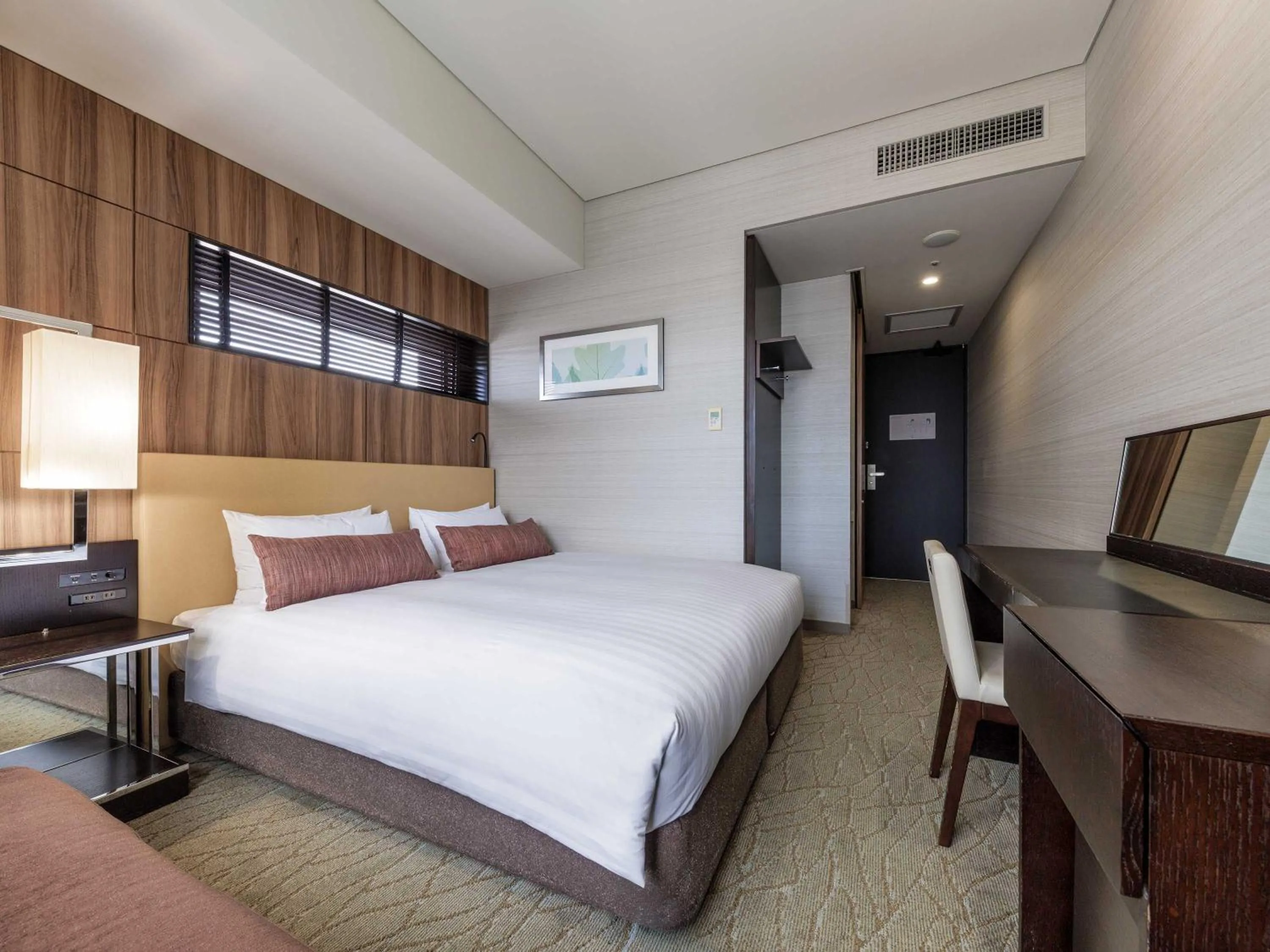 Photo of the whole room, Bed in Solaria Nishitetsu Hotel Kagoshima