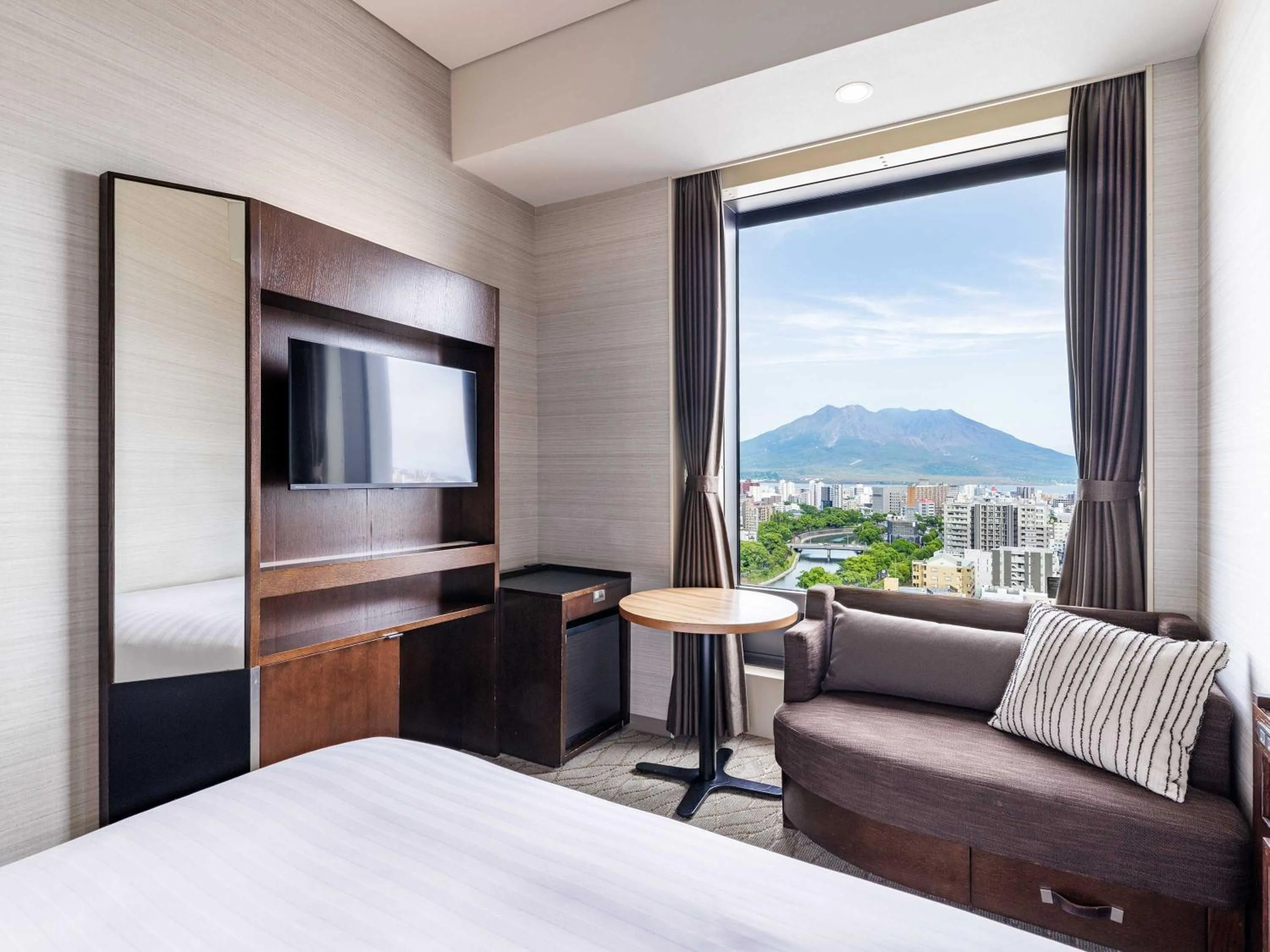 Photo of the whole room, Bed in Solaria Nishitetsu Hotel Kagoshima