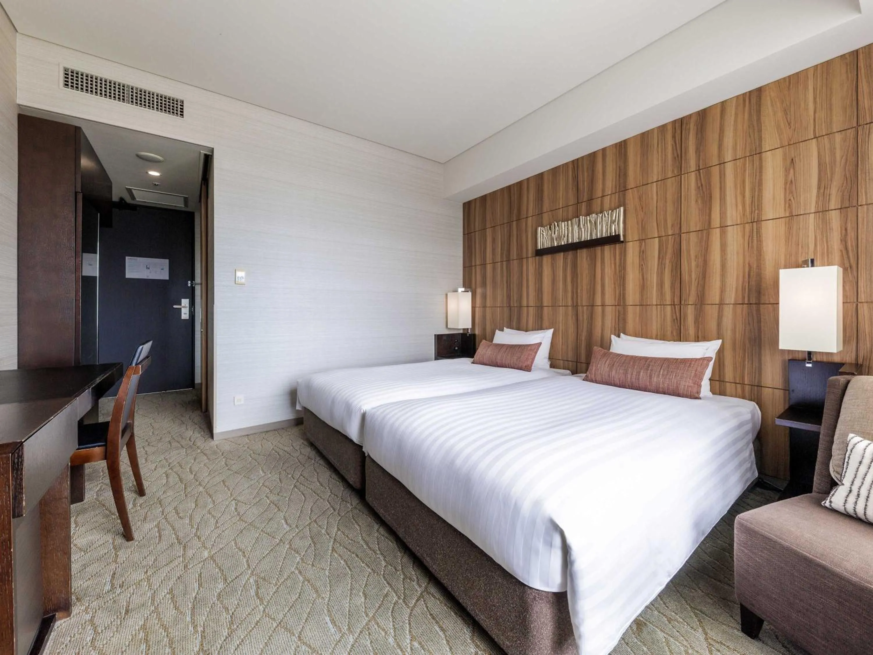 Photo of the whole room, Bed in Solaria Nishitetsu Hotel Kagoshima